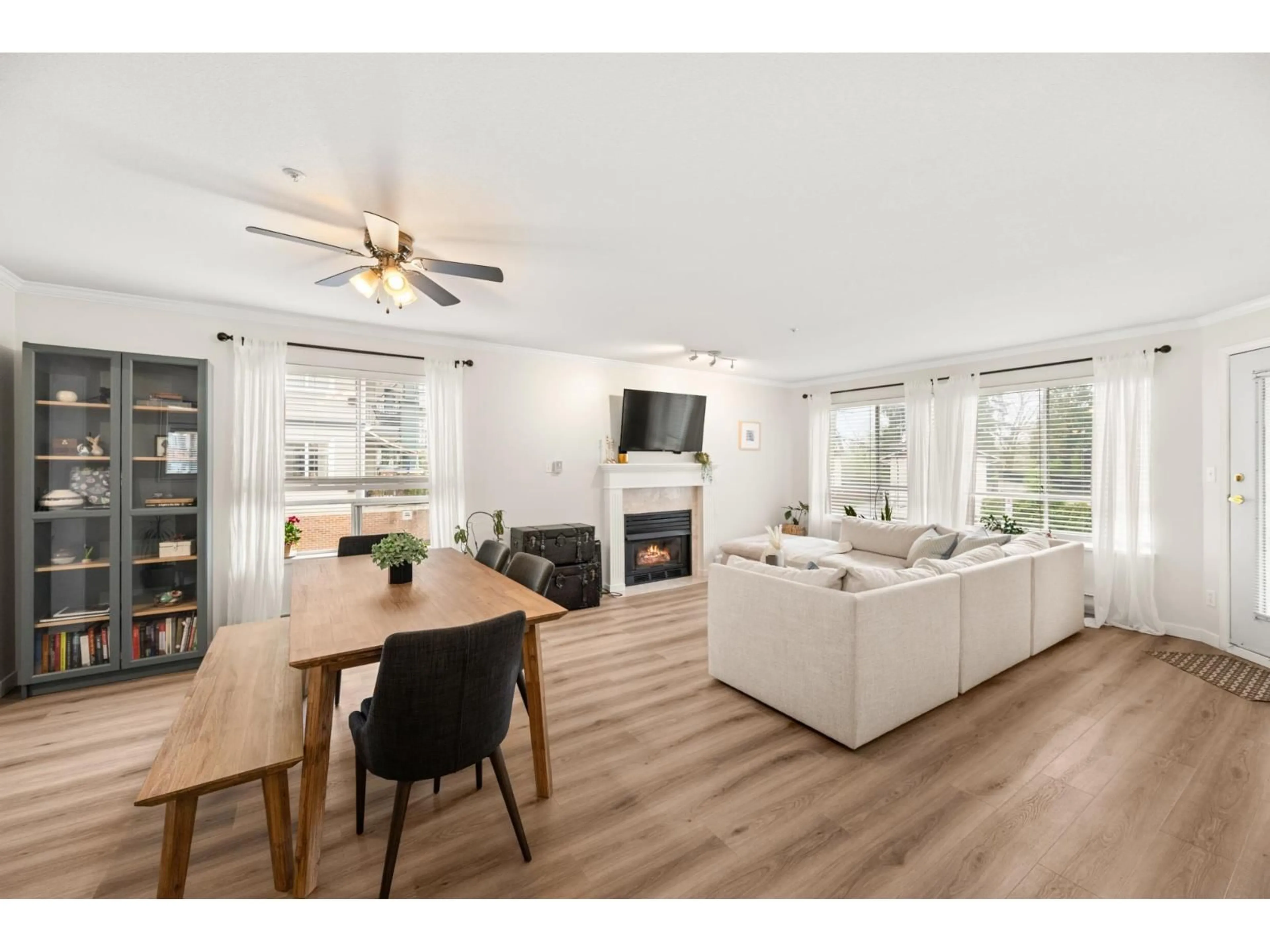 Living room with furniture, wood/laminate floor for 108 - 5450 208 STREET, Langley British Columbia V3A2J9