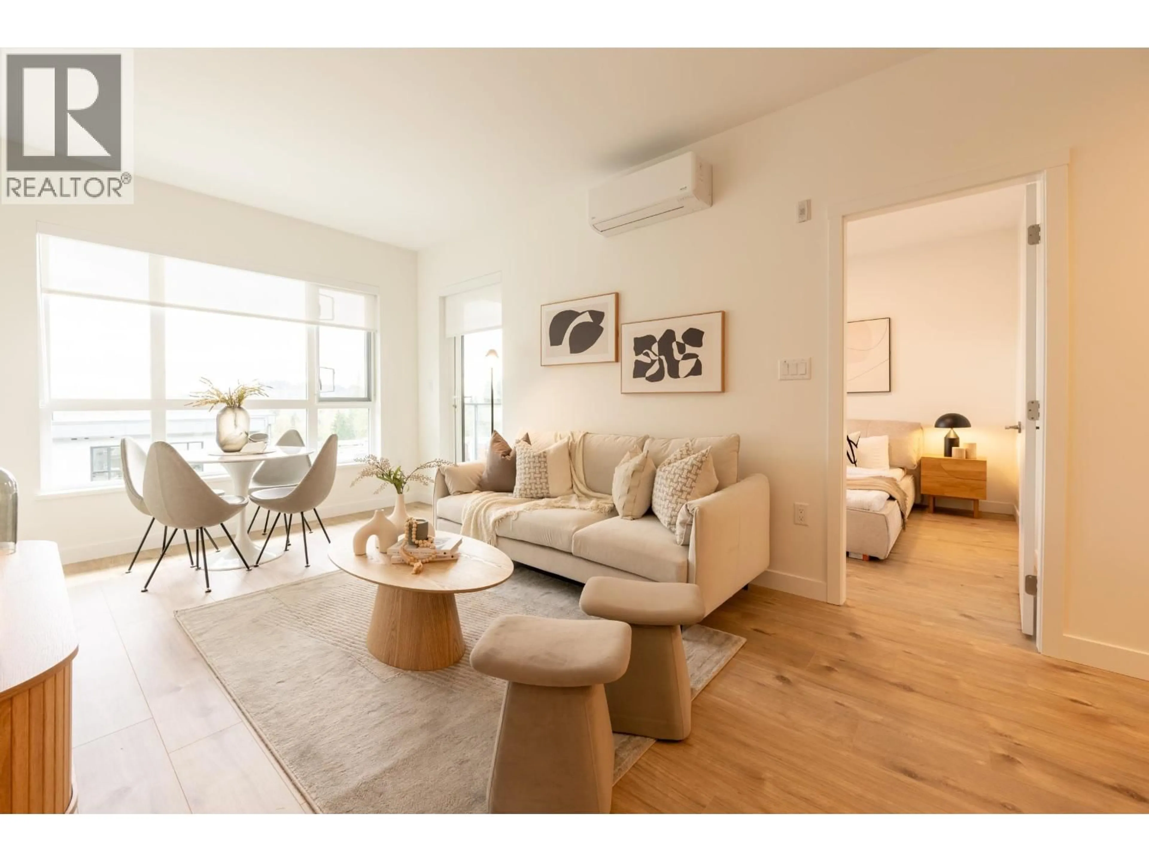 Living room with furniture, unknown for 605 - 3596 MALSUM DRIVE, North Vancouver British Columbia V7G0B5