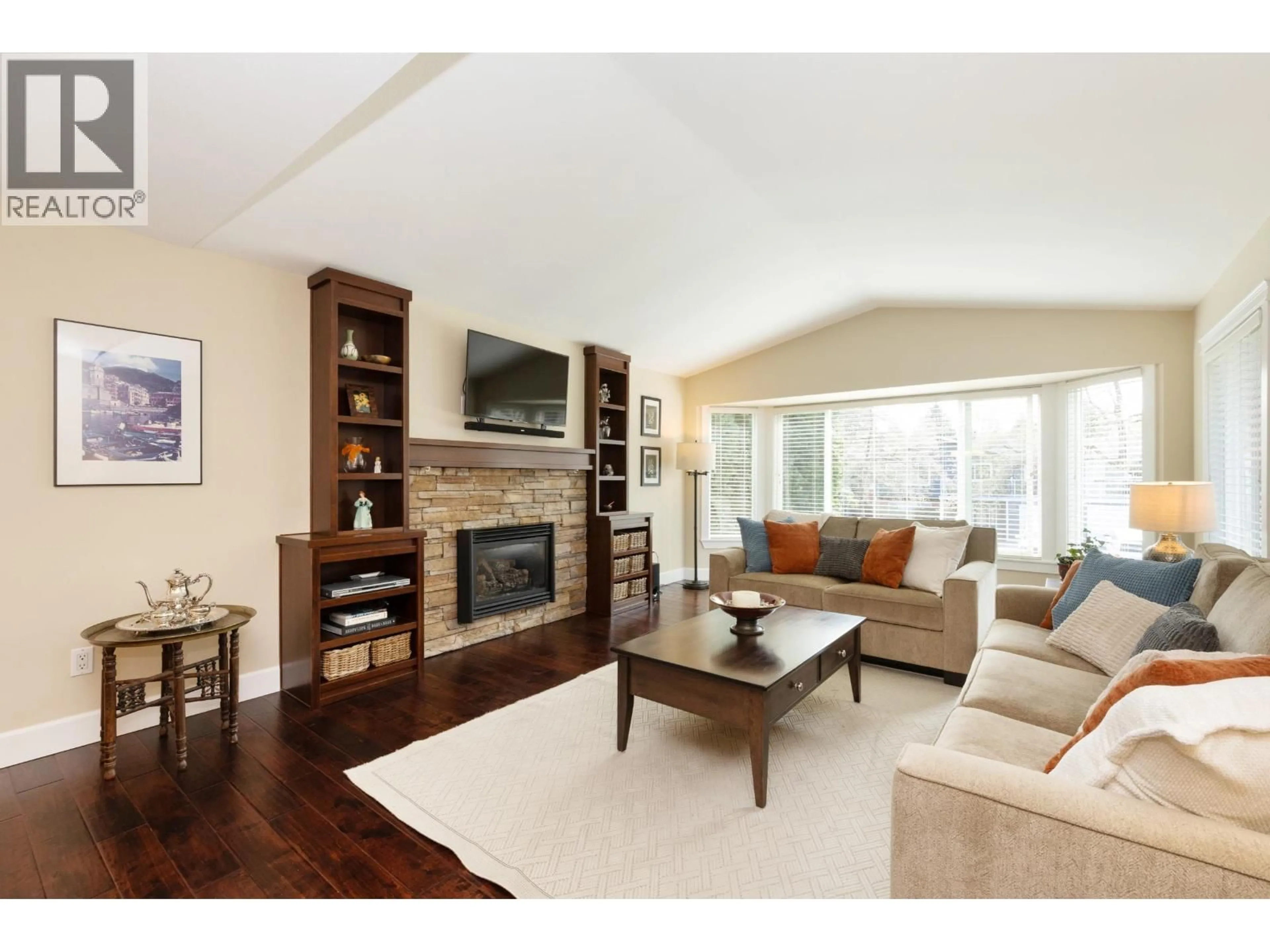 Living room with furniture, wood/laminate floor for 20885 124TH AVENUE, Maple Ridge British Columbia V4R2M9