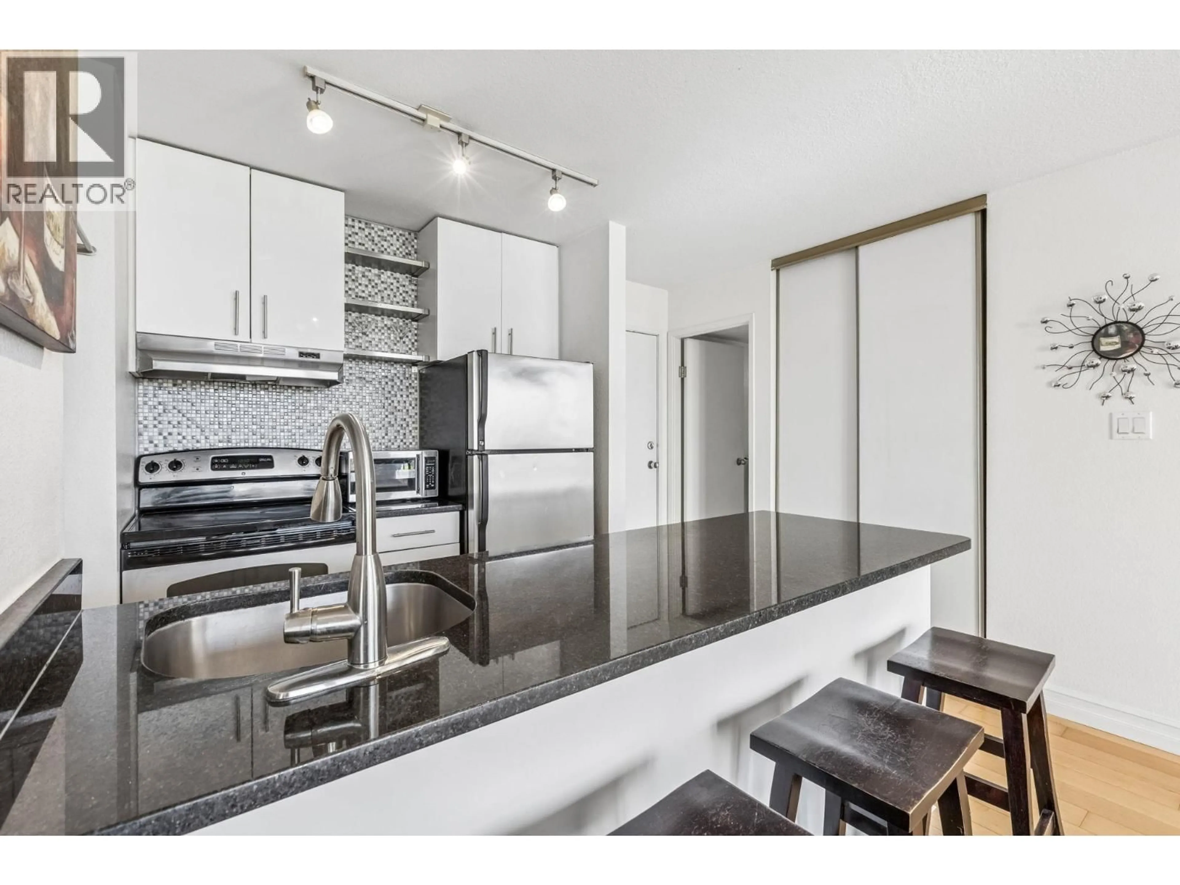 Open concept kitchen, unknown for 411 - 1330 BURRARD STREET, Vancouver British Columbia V6Z2B8