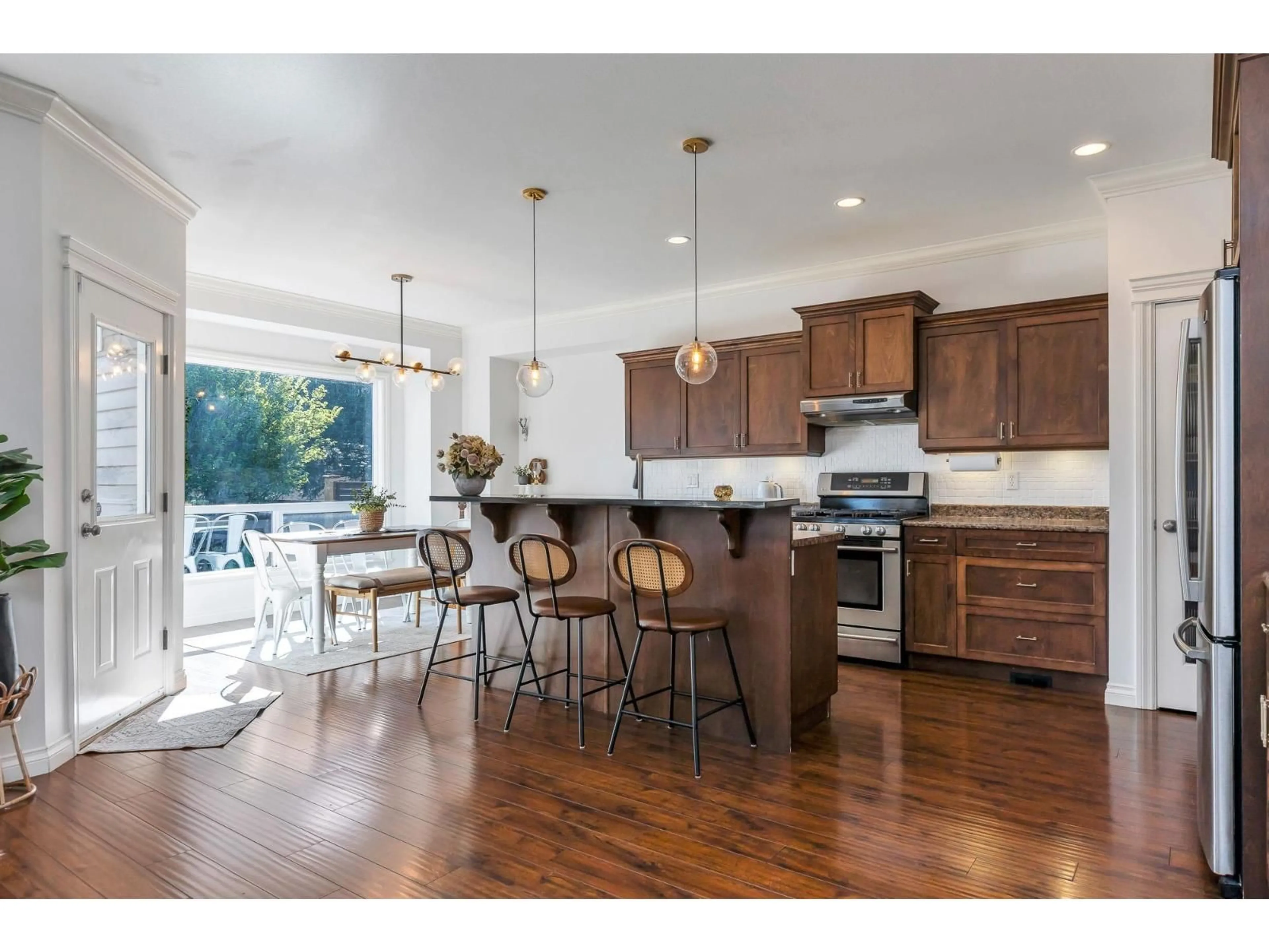 Open concept kitchen, wood/laminate floor for 6664 SCHOOL LANE, Chilliwack British Columbia V2R2C7