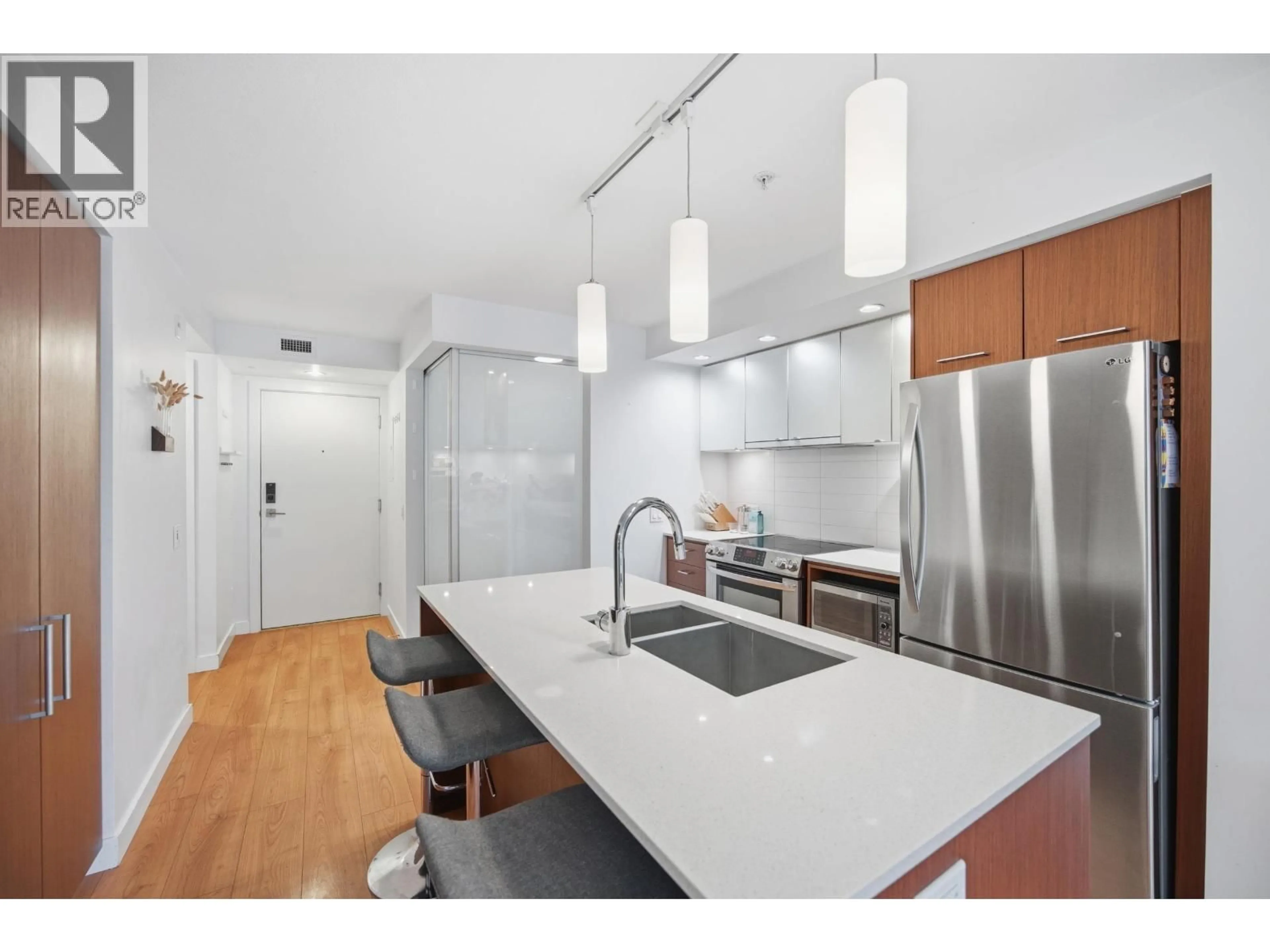 Open concept kitchen, unknown for 209 - 221 3RD STREET, North Vancouver British Columbia V7L0C1