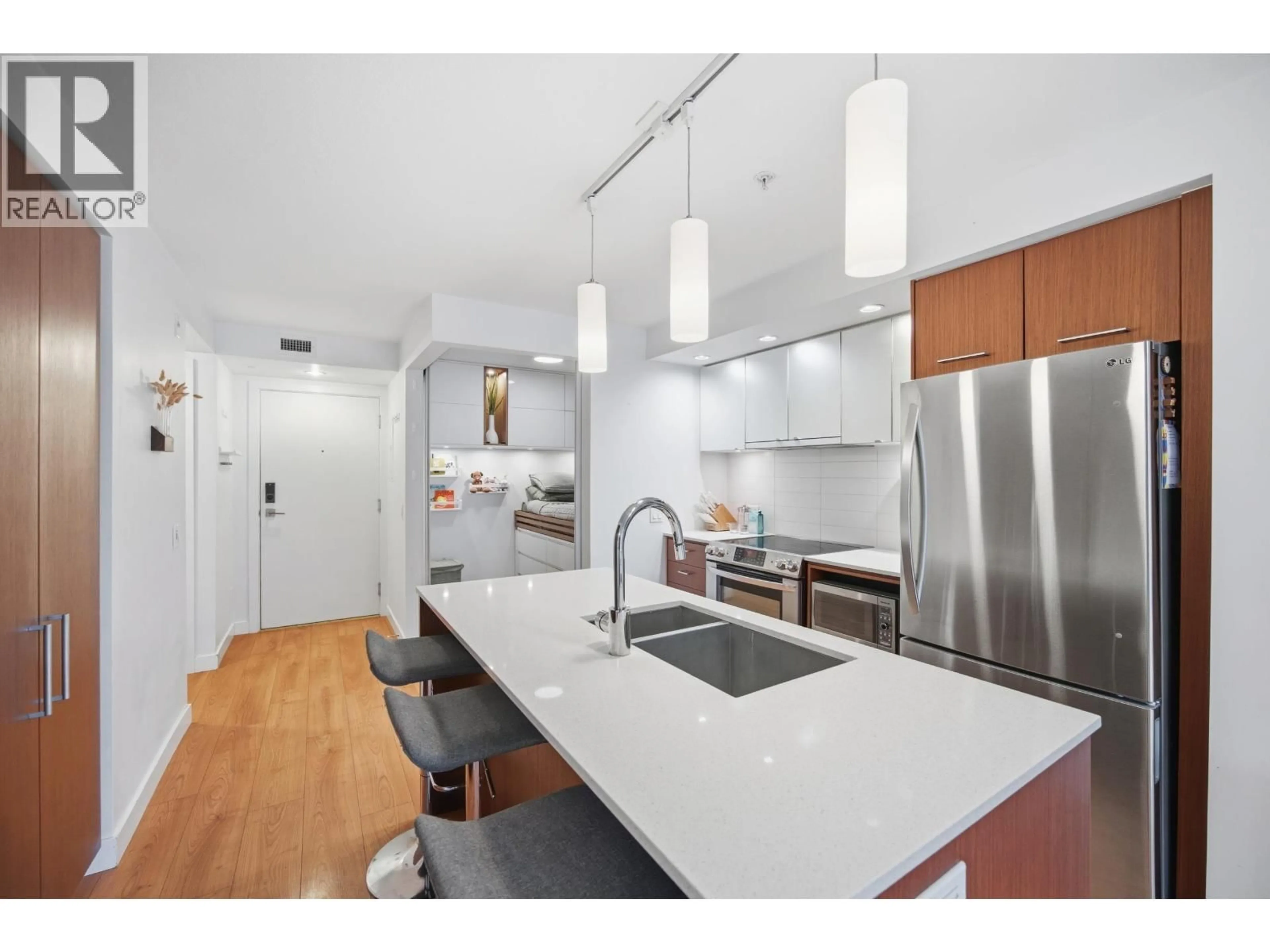 Open concept kitchen, unknown for 209 - 221 3RD STREET, North Vancouver British Columbia V7L0C1