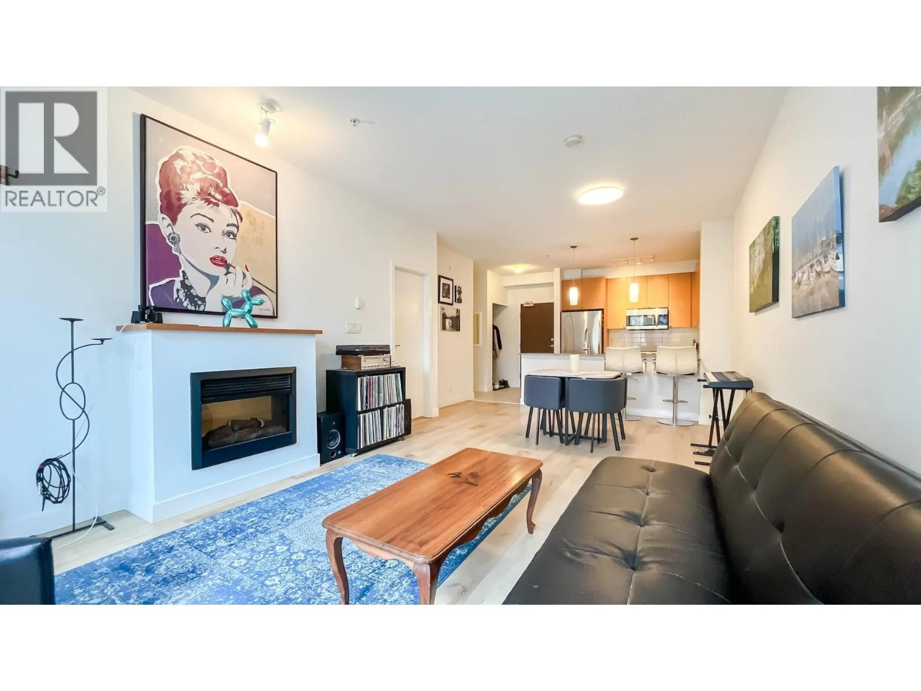 Living room with furniture, unknown for 217 - 101 MORRISSEY ROAD, Port Moody British Columbia V3H0E6