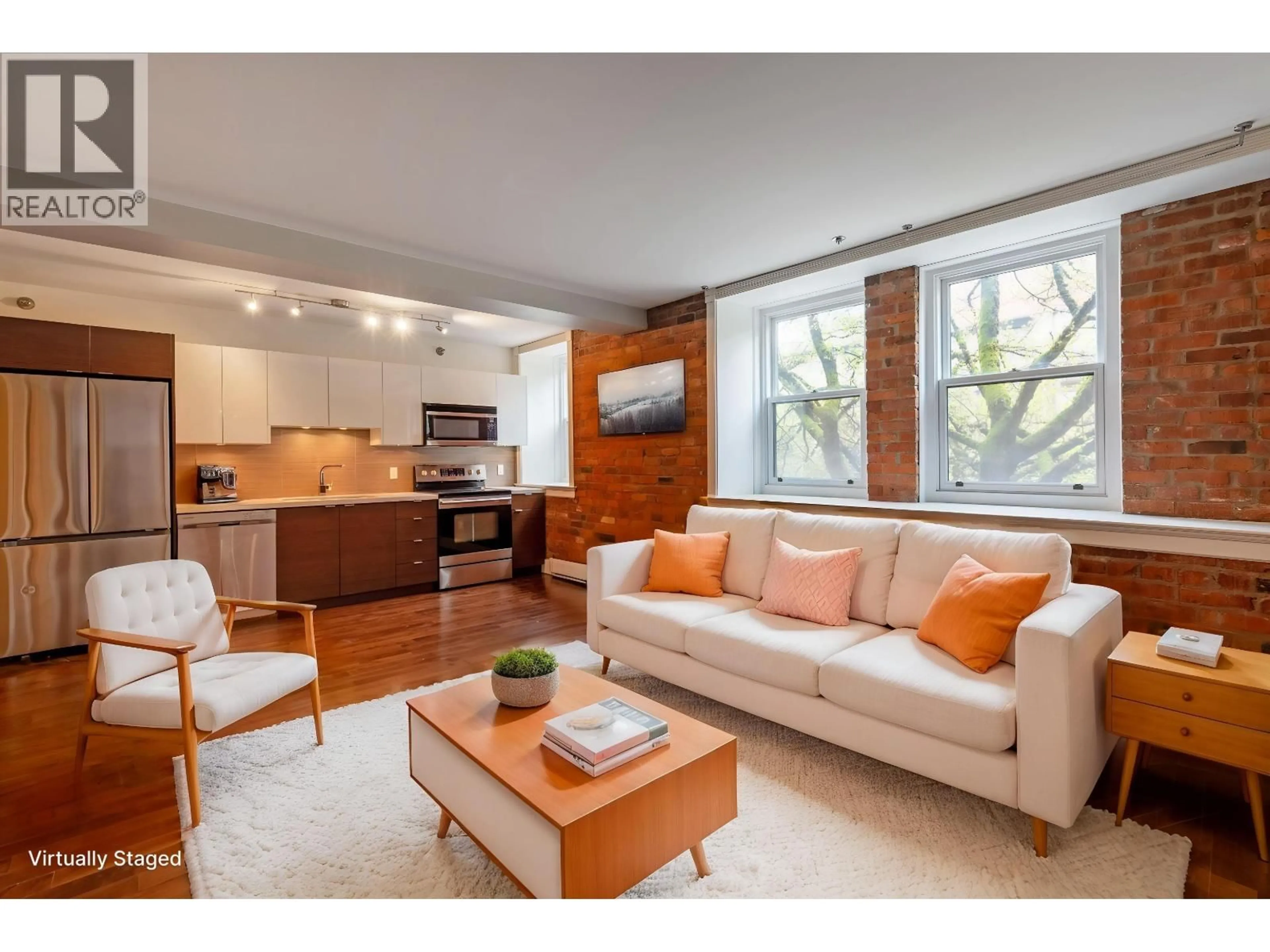 Living room with furniture, wood/laminate floor for 205 - 233 ABBOTT STREET, Vancouver British Columbia V6B2K7