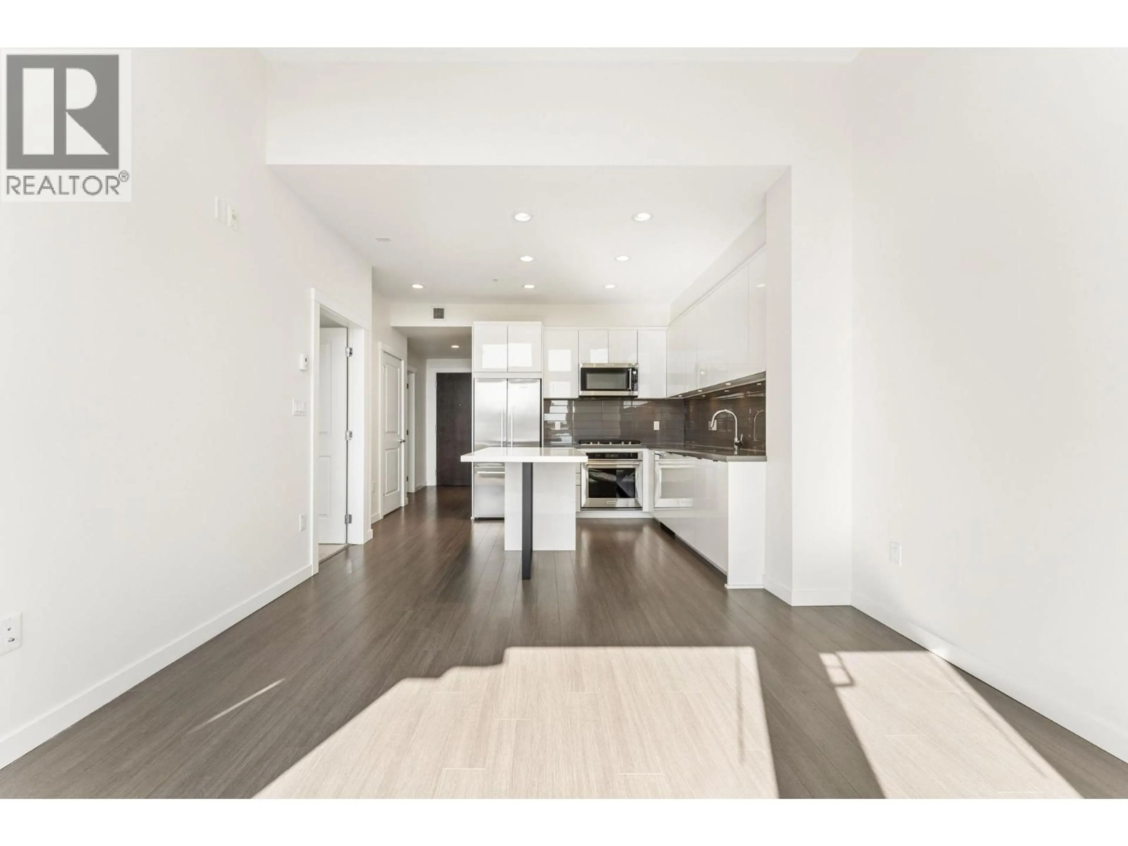 Open concept kitchen, unknown for 502 - 255 1ST STREET, North Vancouver British Columbia V7M3G8