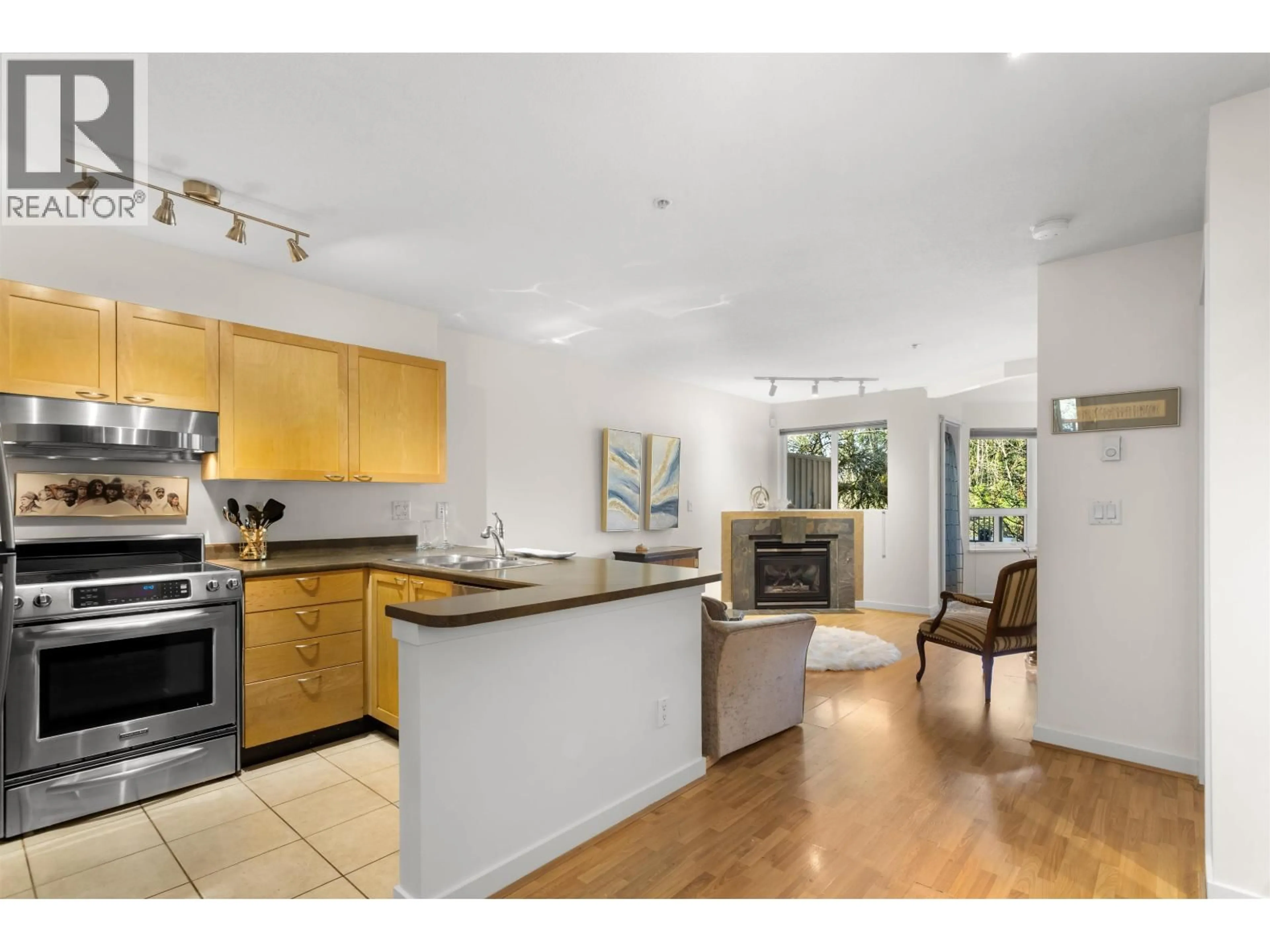 Open concept kitchen, unknown for 210 - 7383 GRIFFITHS DRIVE, Burnaby British Columbia V5E4M8