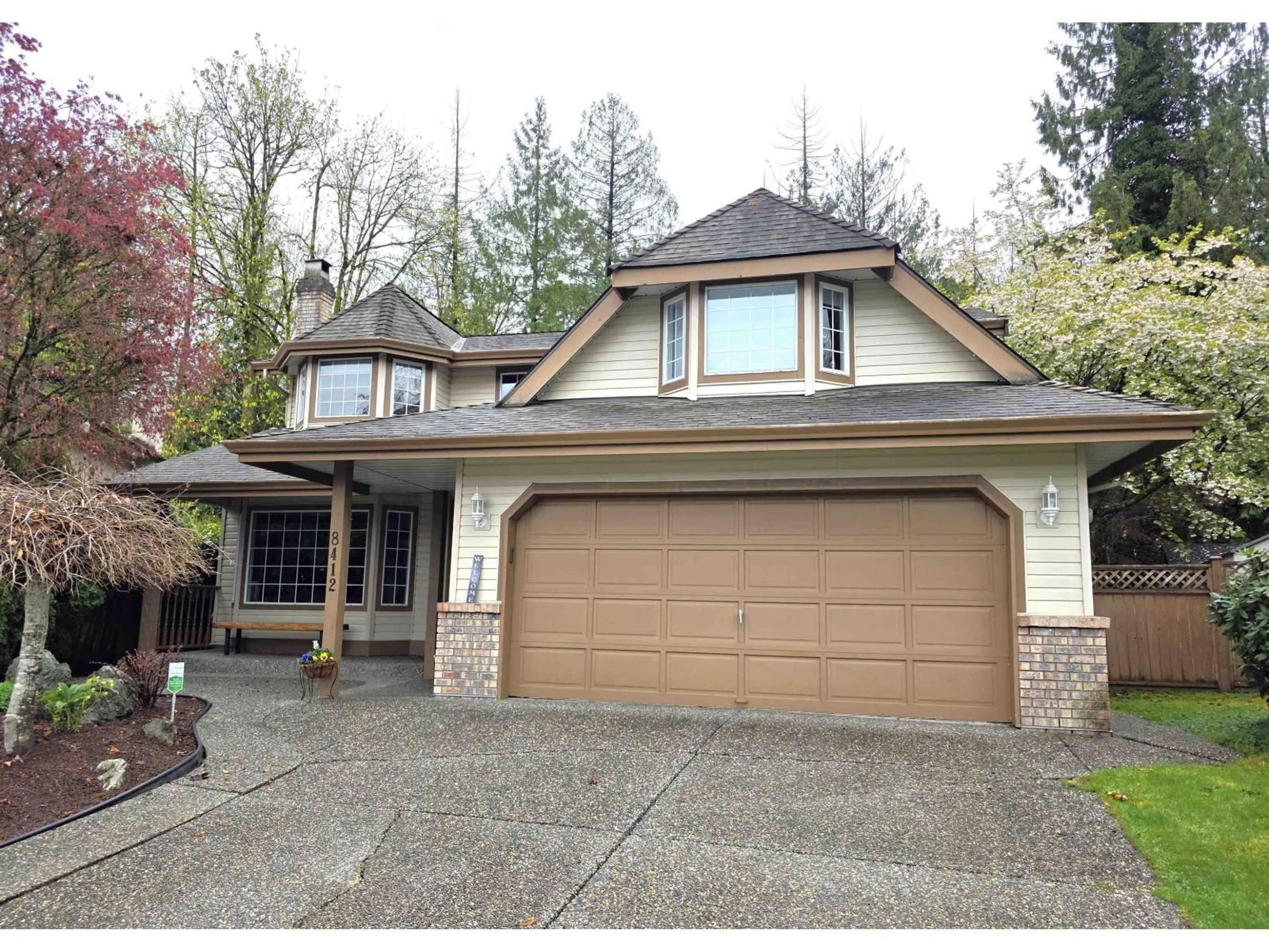 Home with vinyl exterior material, street for 8412 213TH STREET, Langley British Columbia V1M2J1