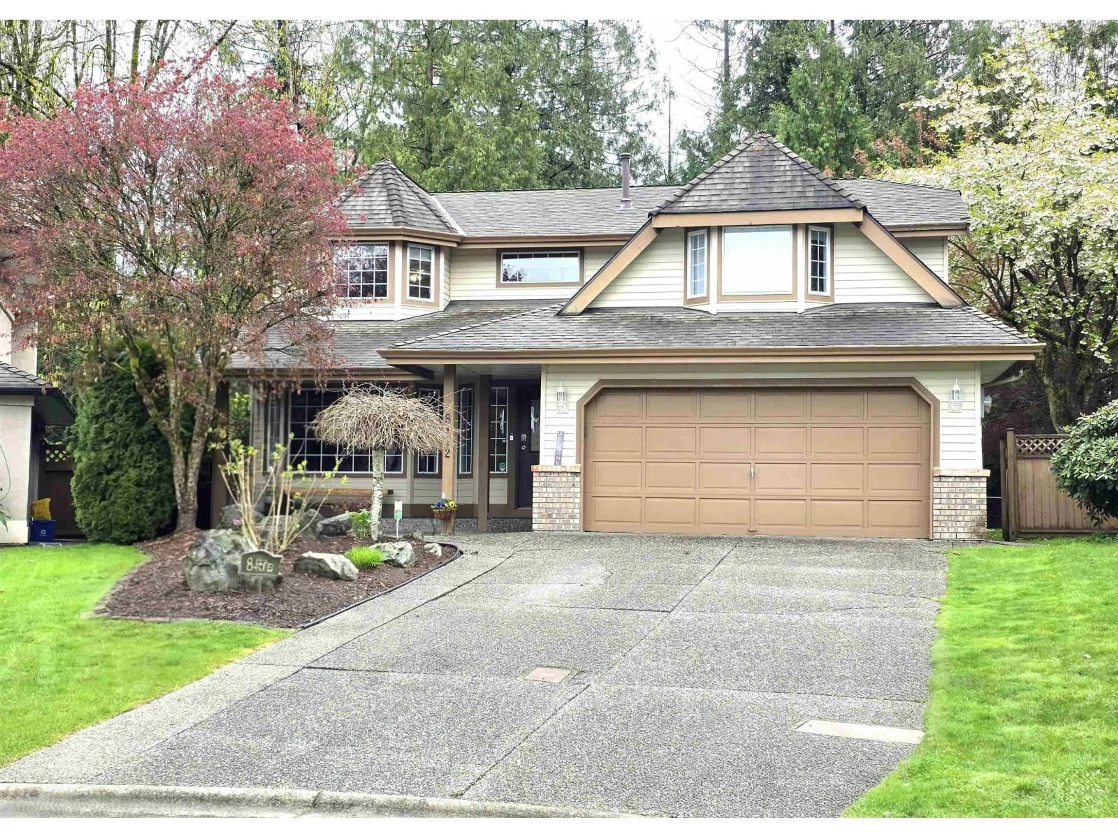 Home with vinyl exterior material, street for 8412 213TH STREET, Langley British Columbia V1M2J1