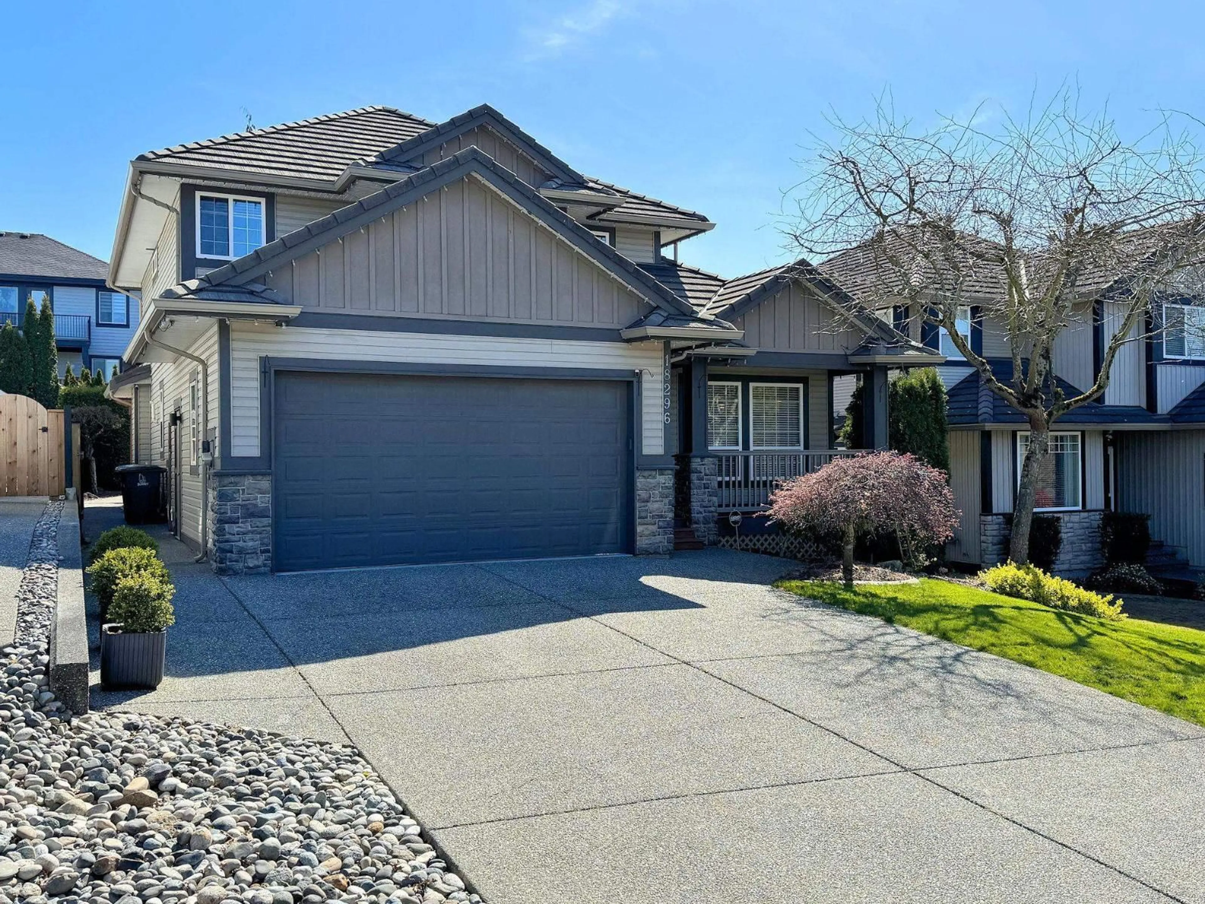 Home with vinyl exterior material, street for 18296 66 AVENUE, Surrey British Columbia V3S9A1