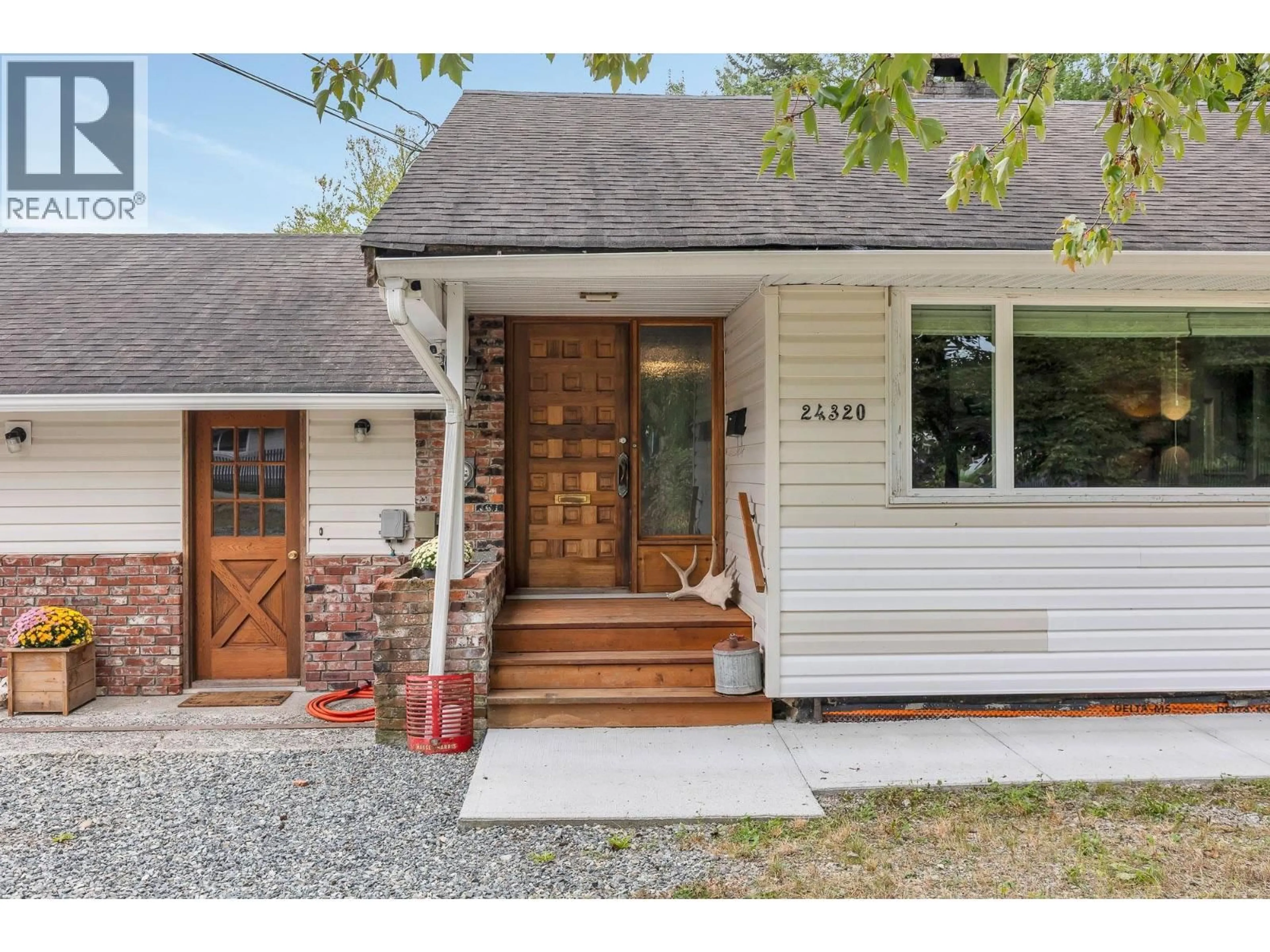 Home with brick exterior material, street for 24320 116 AVENUE, Maple Ridge British Columbia V4R1L7