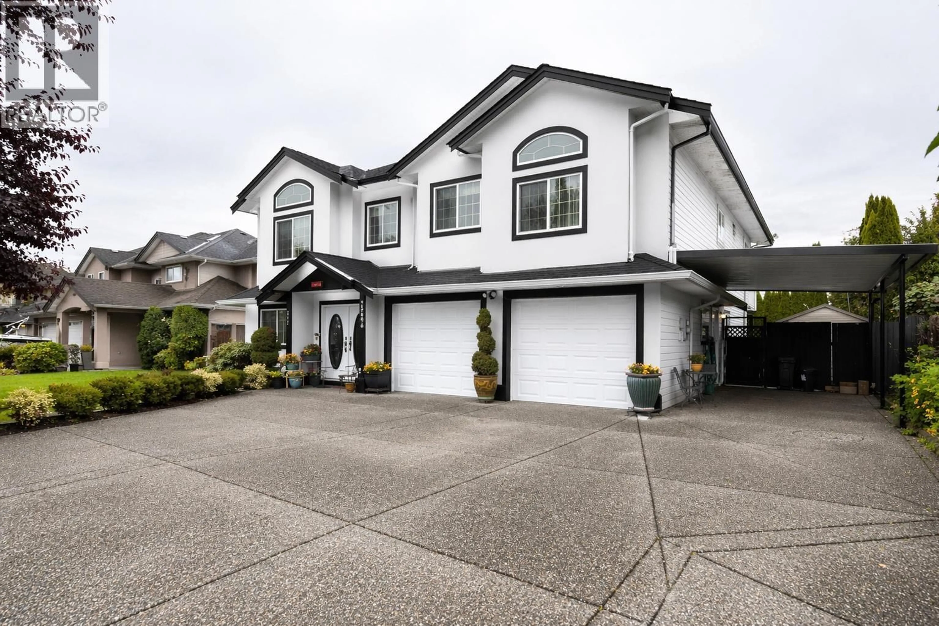 Home with vinyl exterior material, street for 12696 227TH STREET, Maple Ridge British Columbia V2R6K3