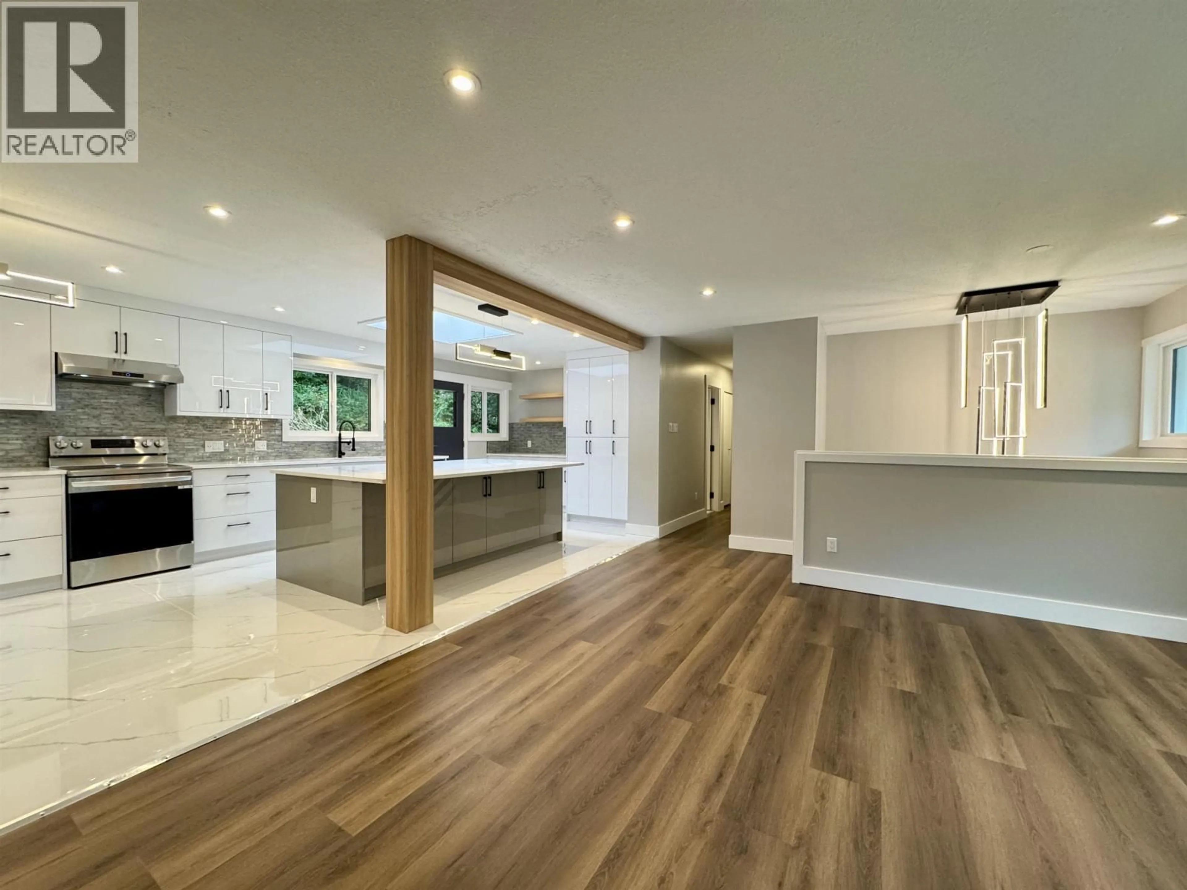 Open concept kitchen, wood/laminate floor for 1831 KOOTENAY AVENUE, Prince Rupert British Columbia V8J4A3