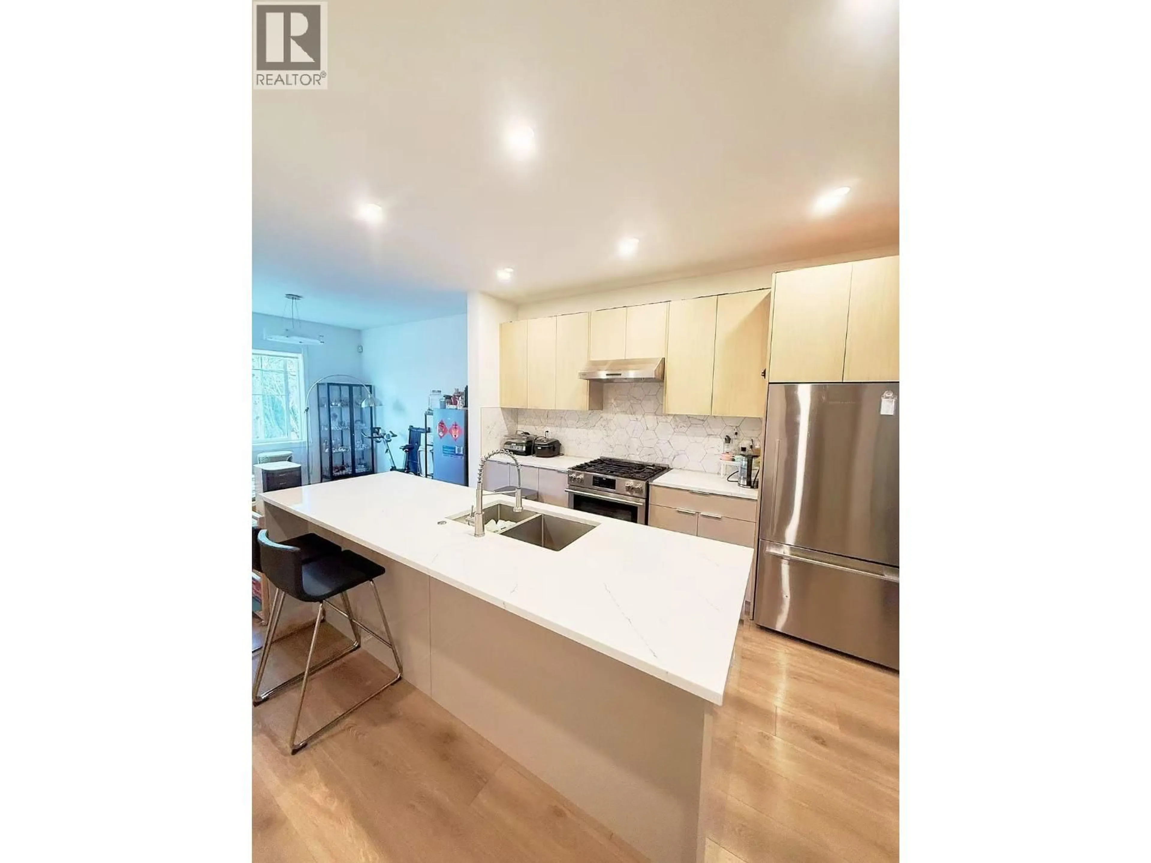 Open concept kitchen, wood/laminate floor for 8 - 7780 BRIDGE STREET, Richmond British Columbia V6Y0L2