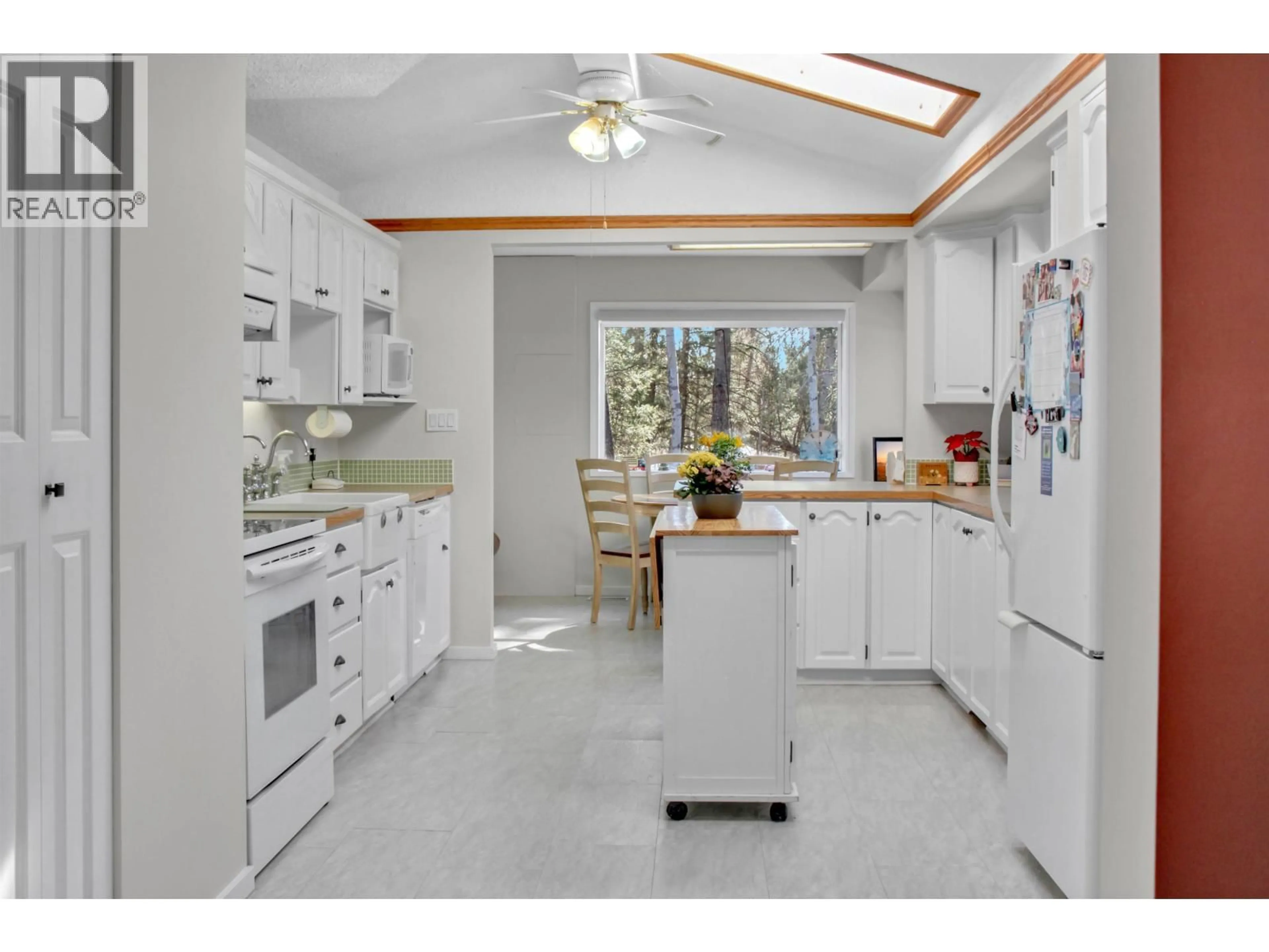 Standard kitchen, ceramic/tile floor for 5035 HANSEN COURT, 108 Mile Ranch British Columbia V0K2Z0