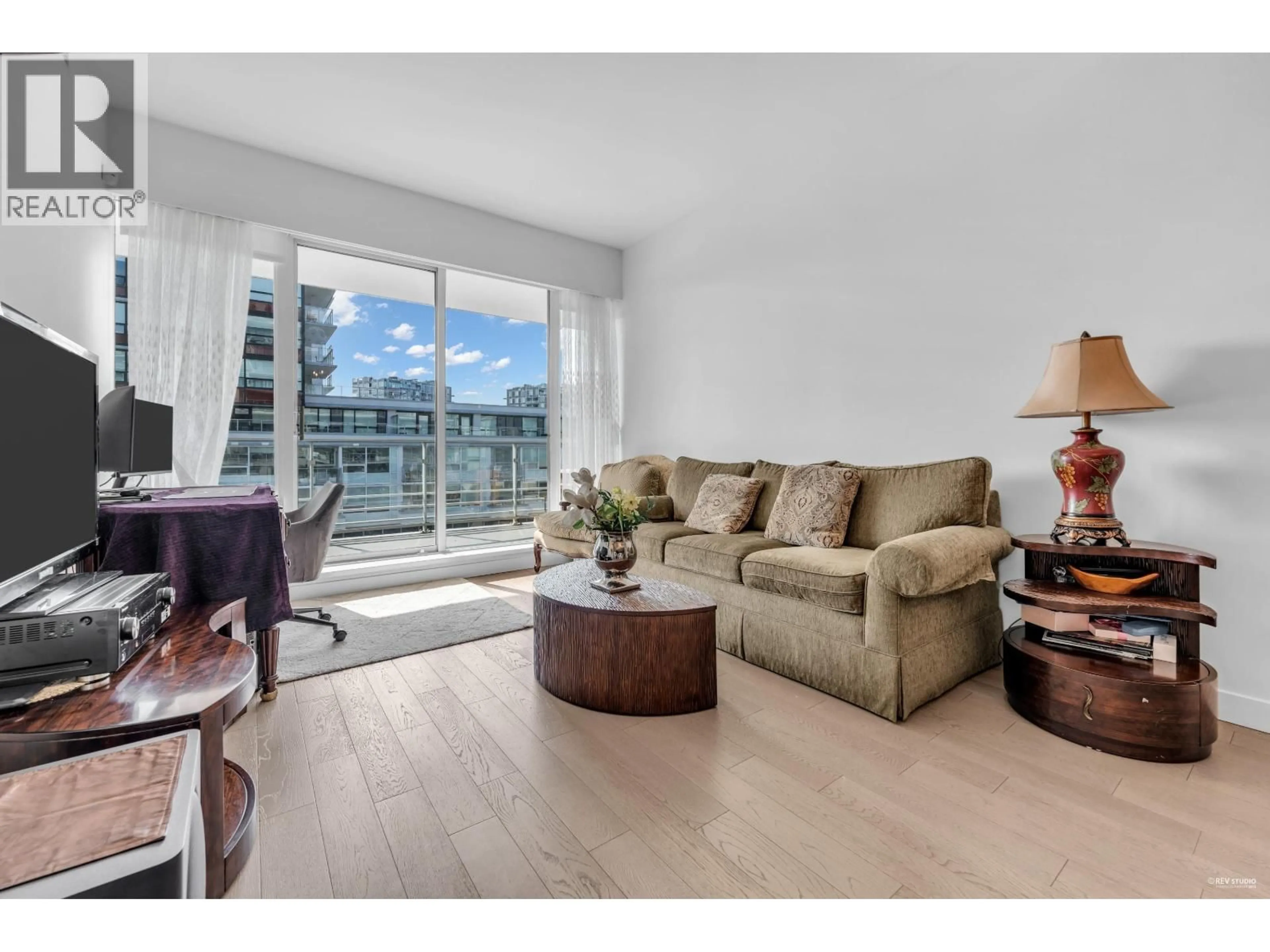 Living room with furniture, wood/laminate floor for 403 - 6699 RIVER ROAD, Richmond British Columbia V7C0E6