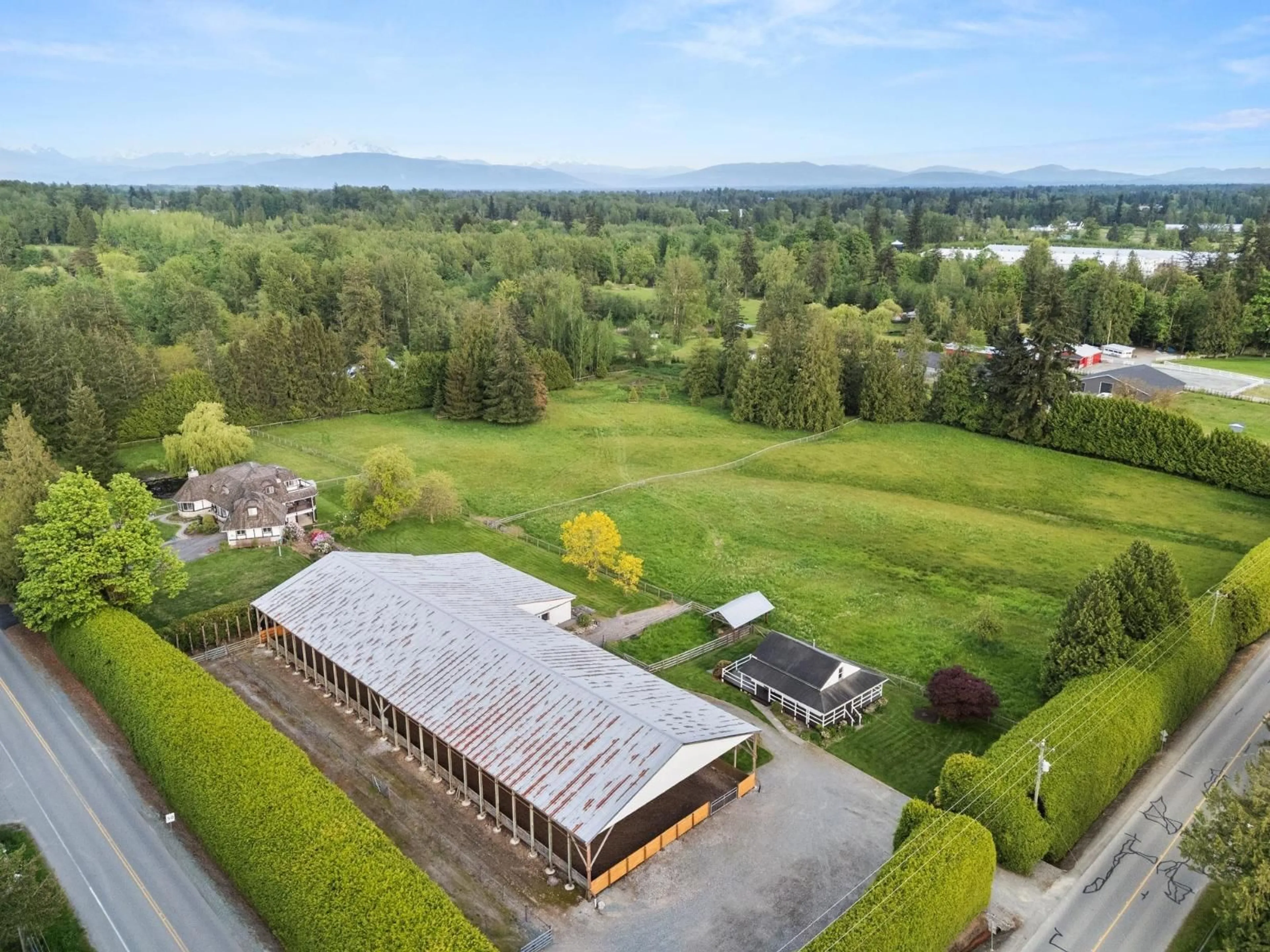A pic from outside/outdoor area/front of a property/back of a property/a pic from drone, mountain view for 23256 24 AVENUE, Langley British Columbia V2Z3A1