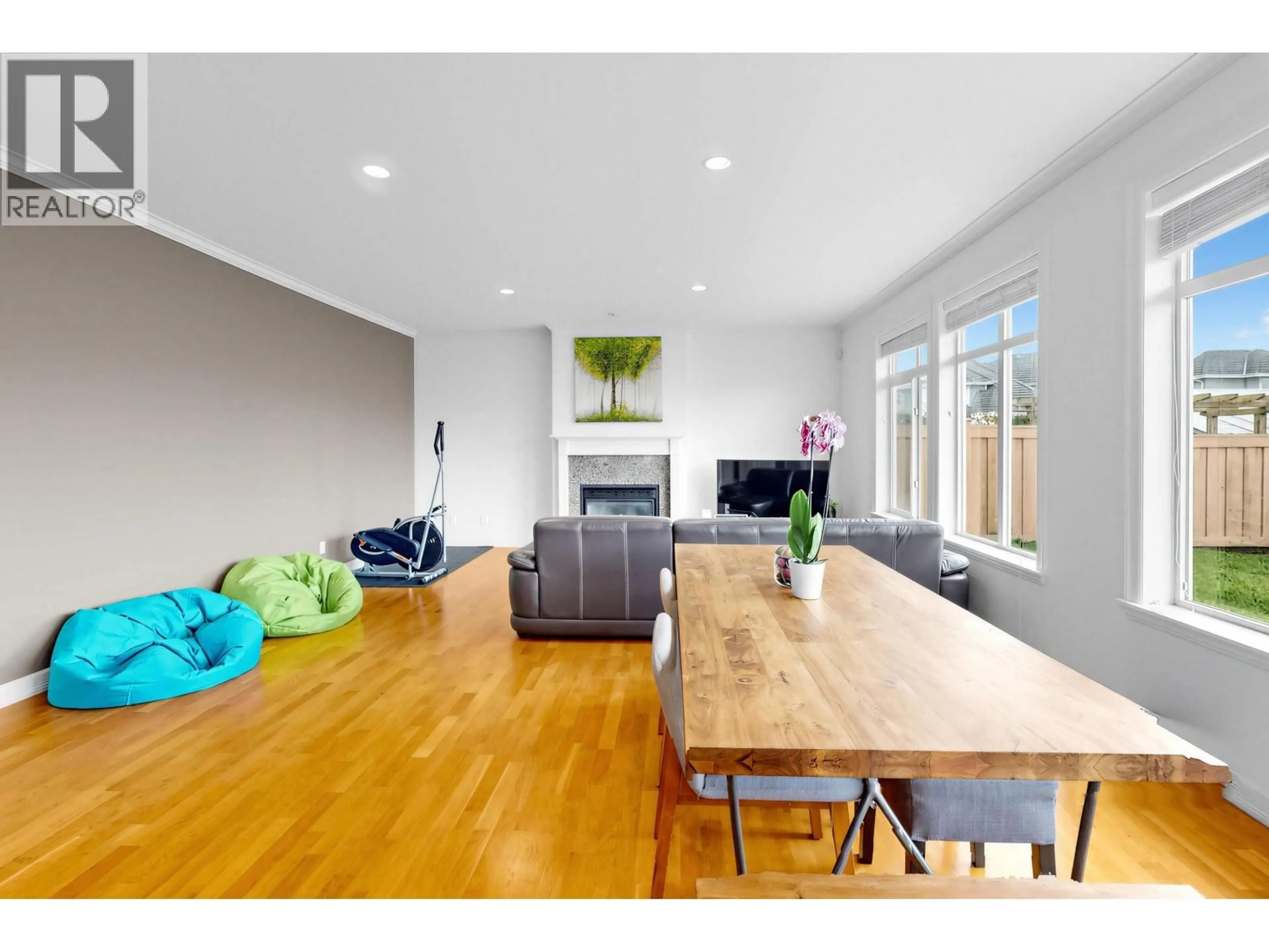 Living room with furniture, wood/laminate floor for 3580 SEMLIN DRIVE, Richmond British Columbia V7C5V7