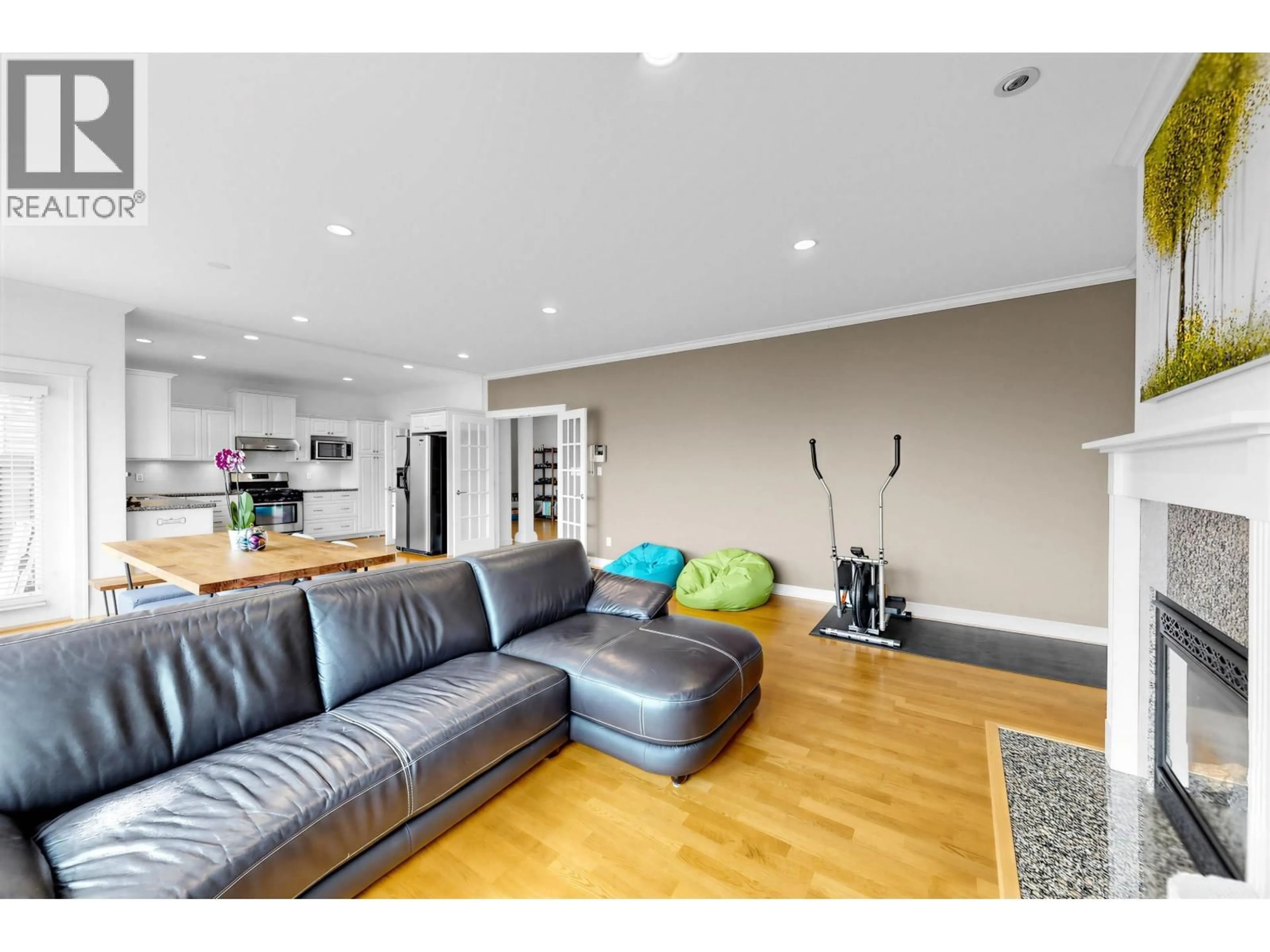 Living room with furniture, wood/laminate floor for 3580 SEMLIN DRIVE, Richmond British Columbia V7C5V7