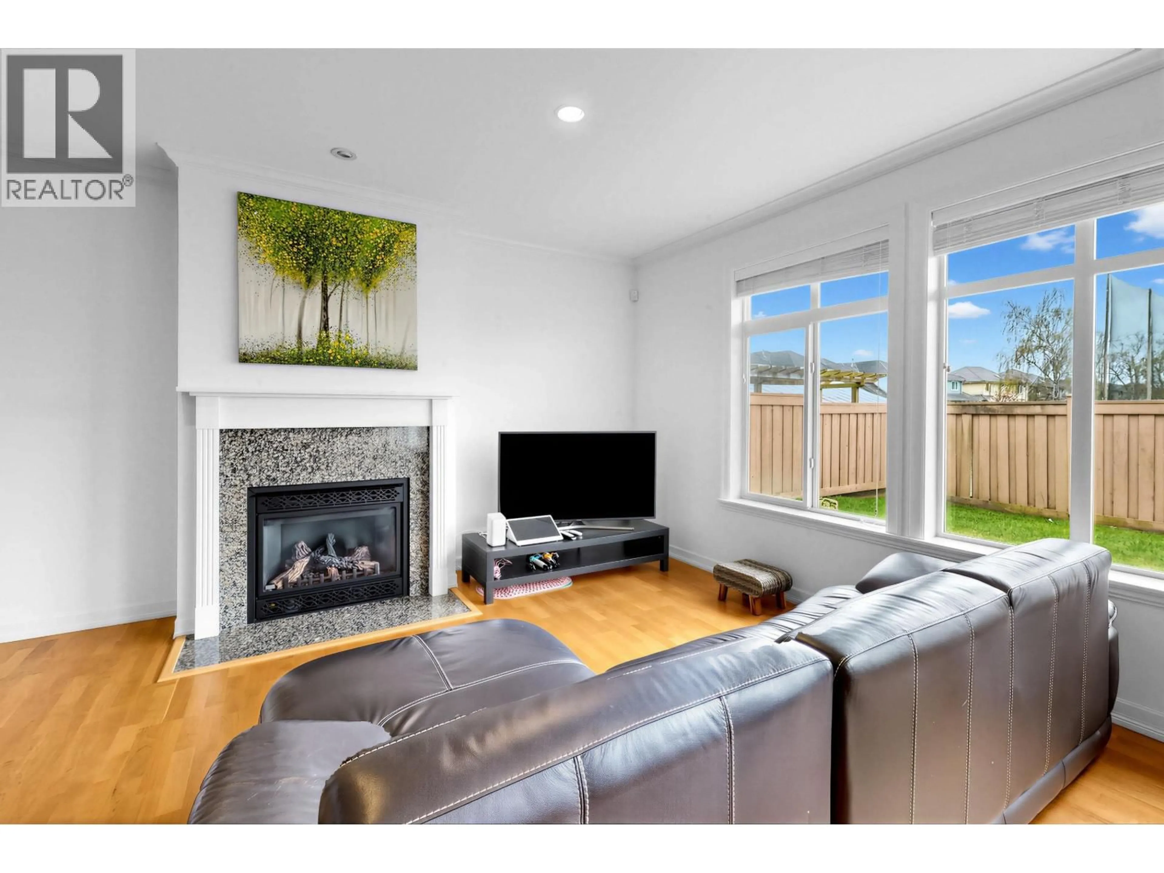 Living room with furniture, wood/laminate floor for 3580 SEMLIN DRIVE, Richmond British Columbia V7C5V7