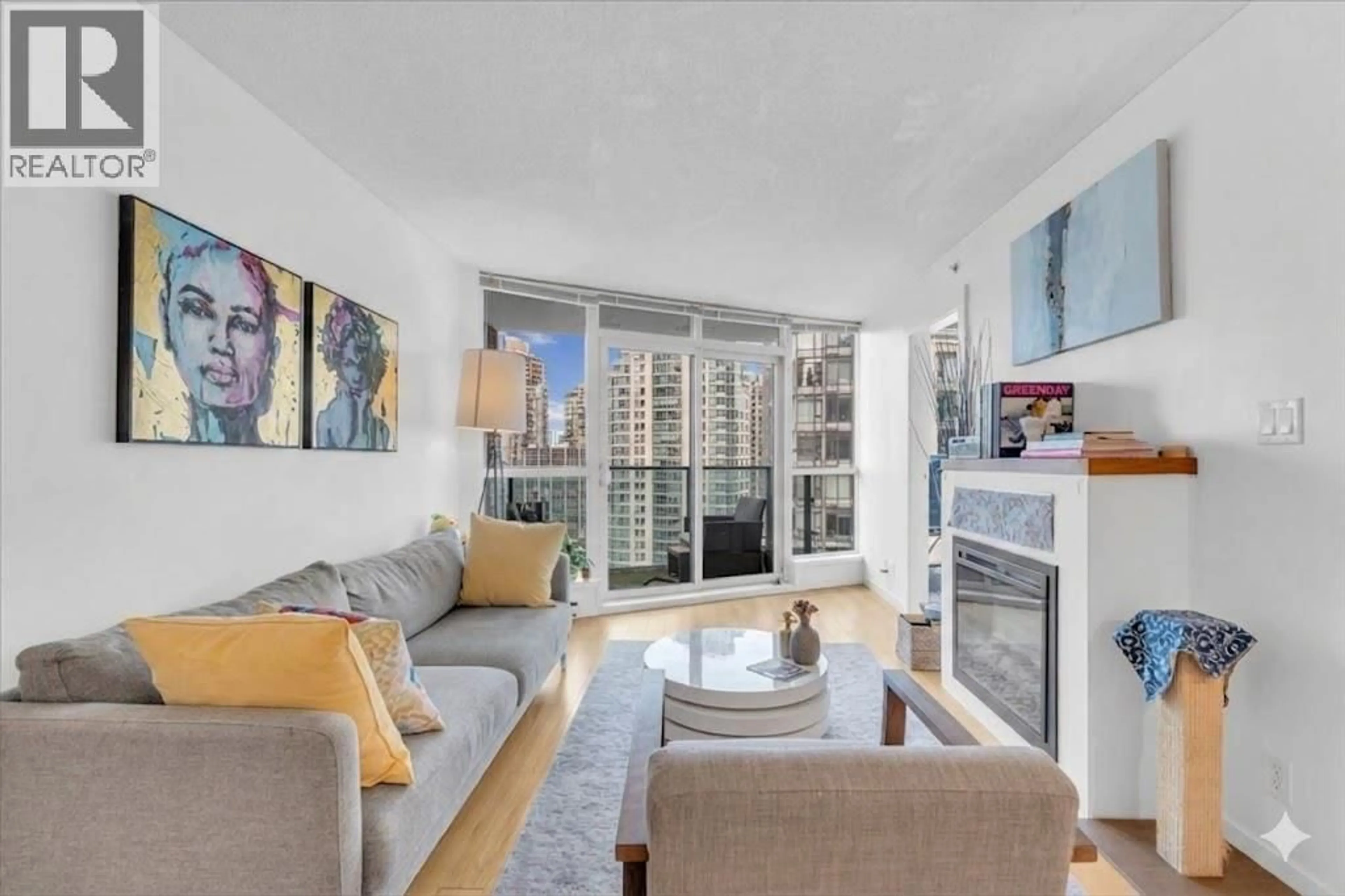 Living room with furniture, unknown for 1707 - 1189 MELVILLE STREET, Vancouver British Columbia V6E4T8