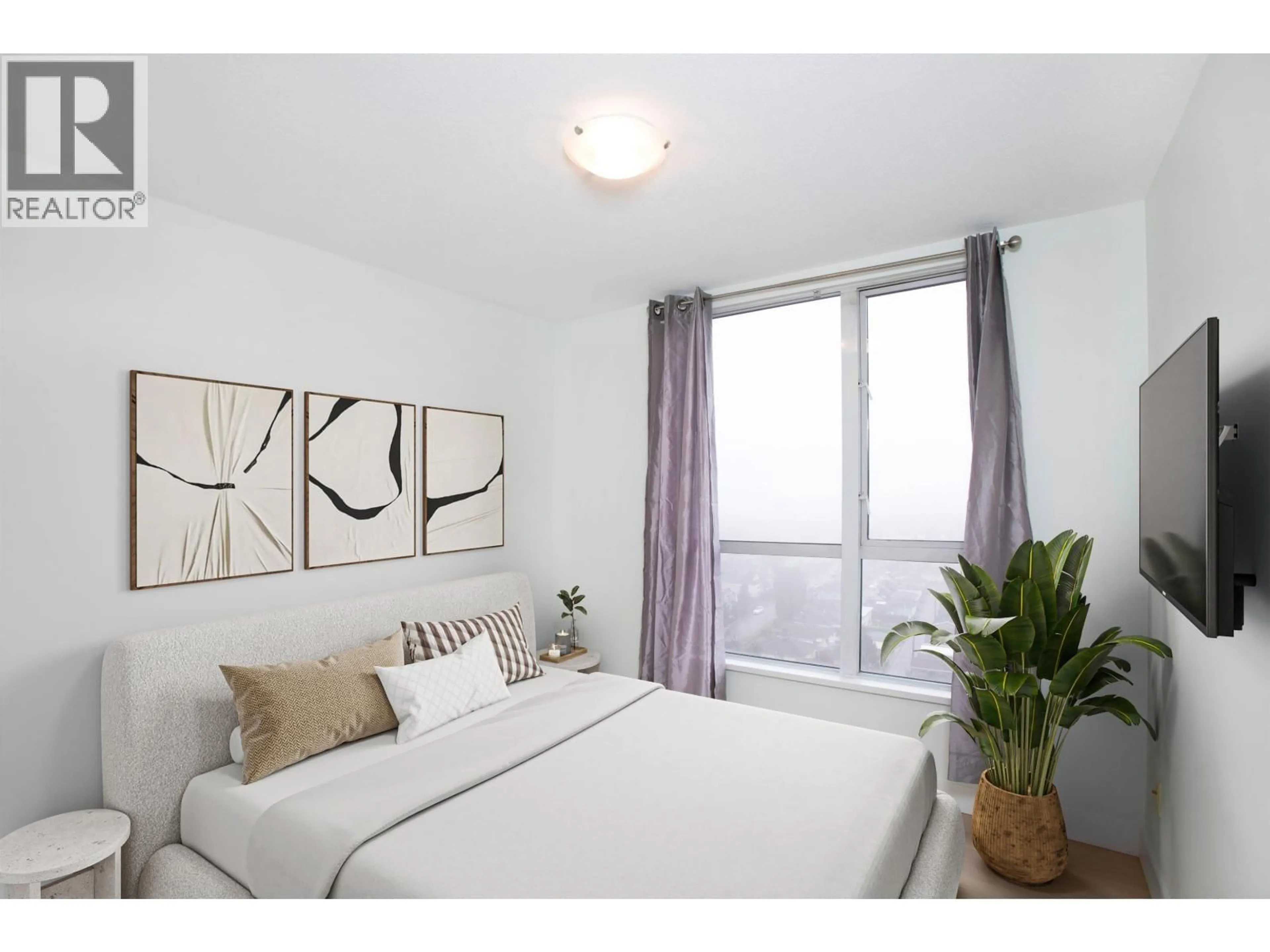 Bedroom with bed, wood/laminate floor for 1808 - 5189 GASTON STREET, Vancouver British Columbia V5R6C7