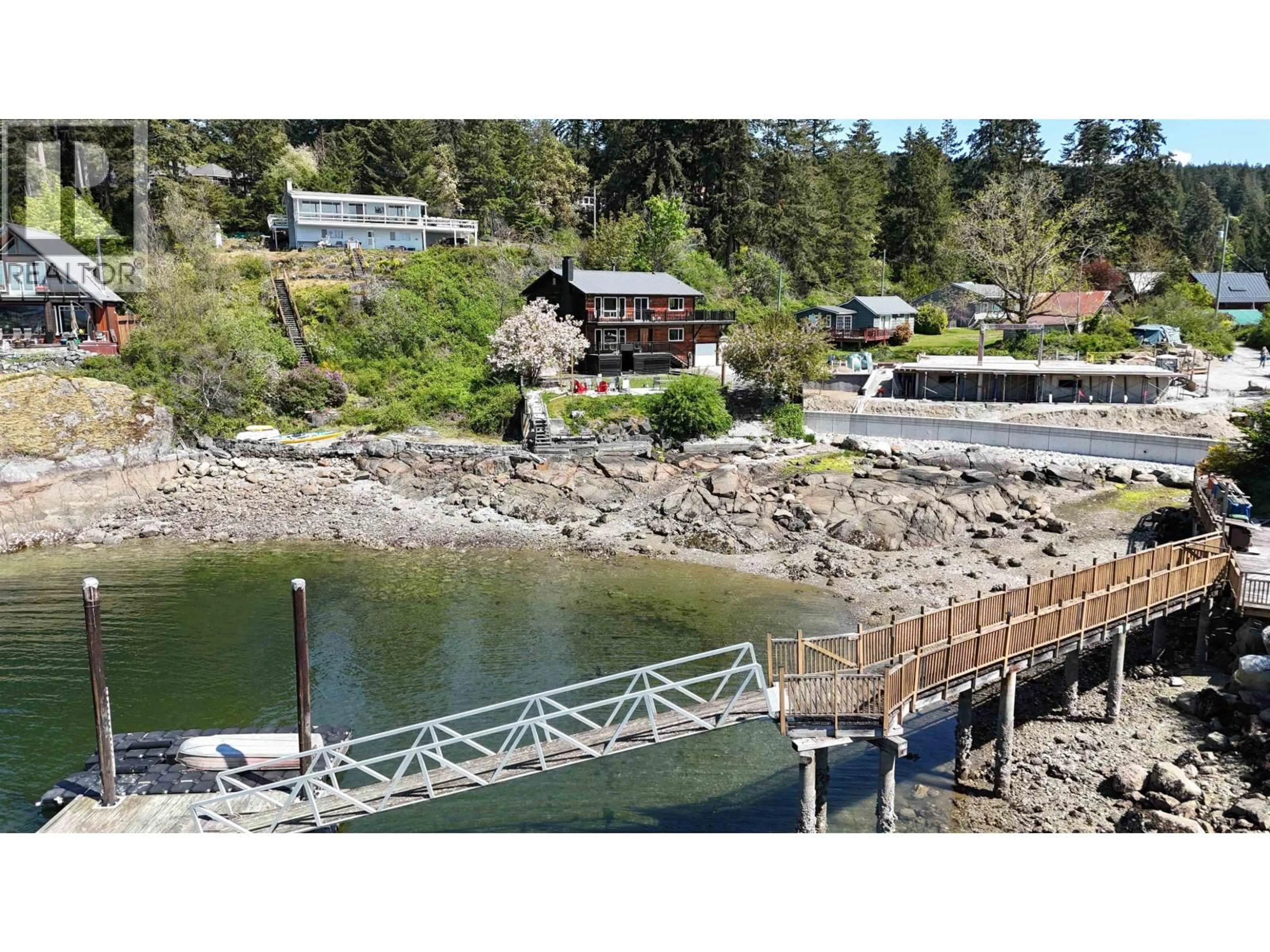 A pic from outside/outdoor area/front of a property/back of a property/a pic from drone, water/lake/river/ocean view for 5639 O'BRIAN ROAD, Halfmoon Bay British Columbia V7Z1E9