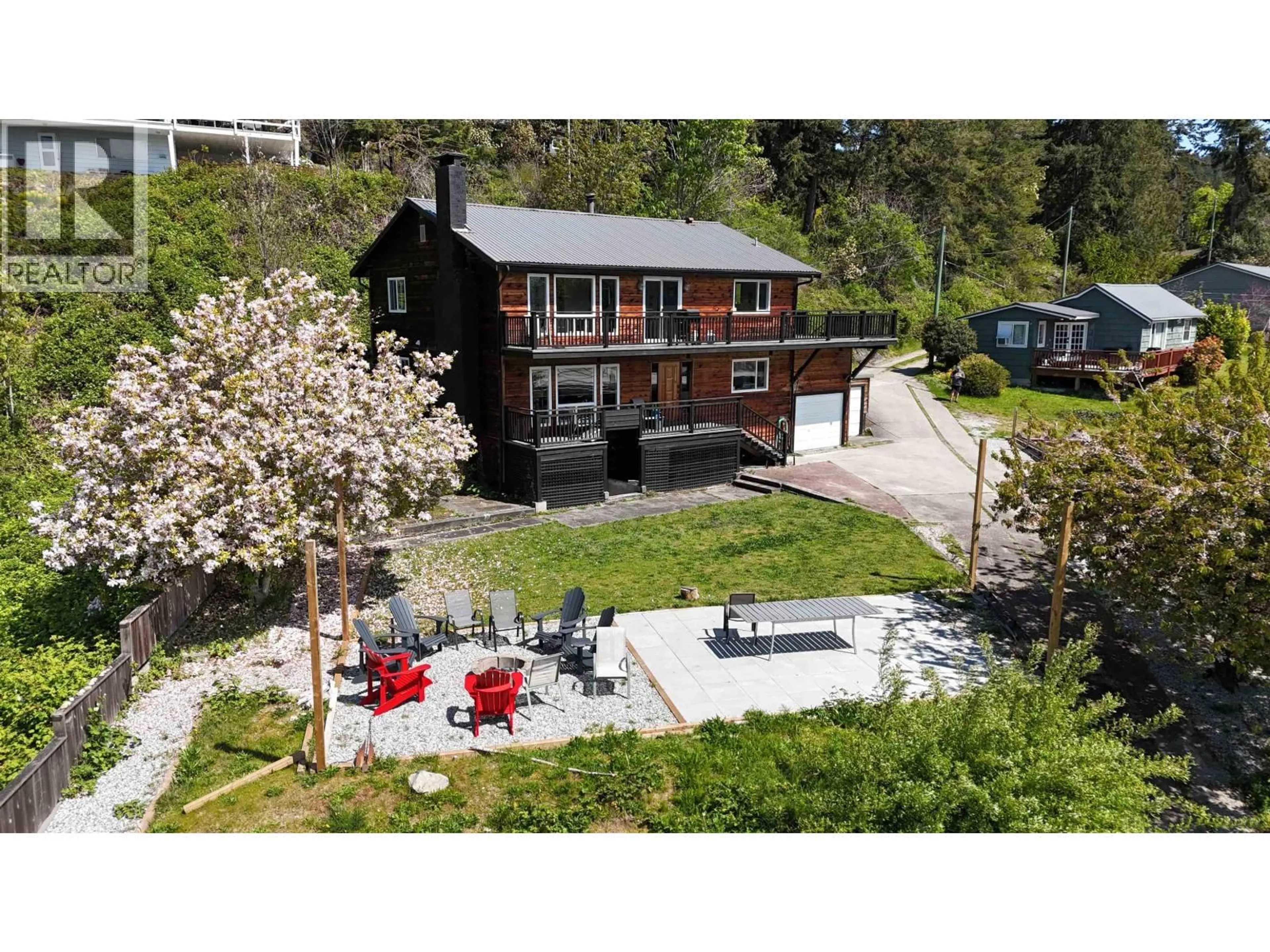 A pic from outside/outdoor area/front of a property/back of a property/a pic from drone, street for 5639 O'BRIAN ROAD, Halfmoon Bay British Columbia V7Z1E9