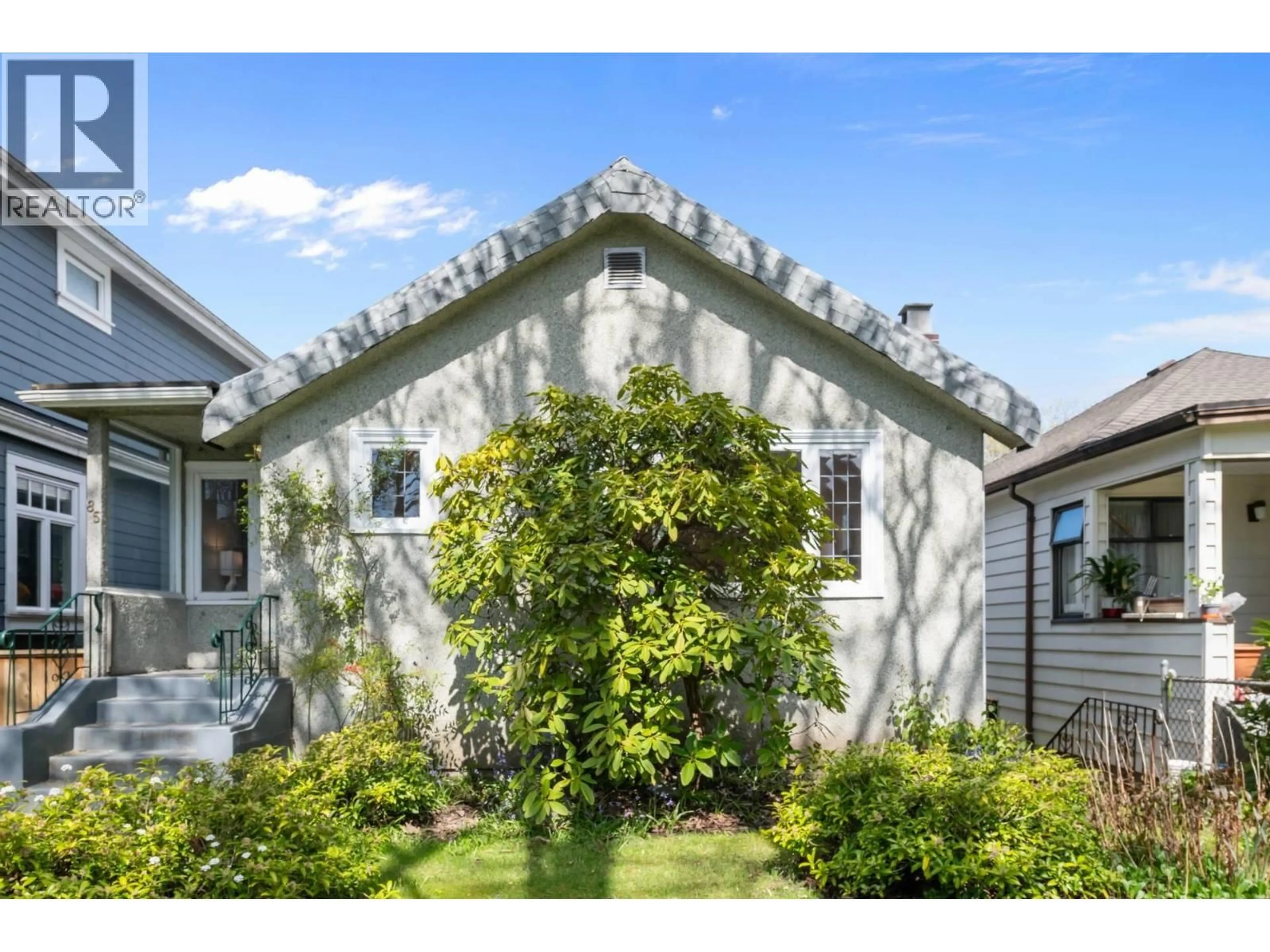 Home with vinyl exterior material, street for 85 W 21ST AVENUE, Vancouver British Columbia V5Y2E1