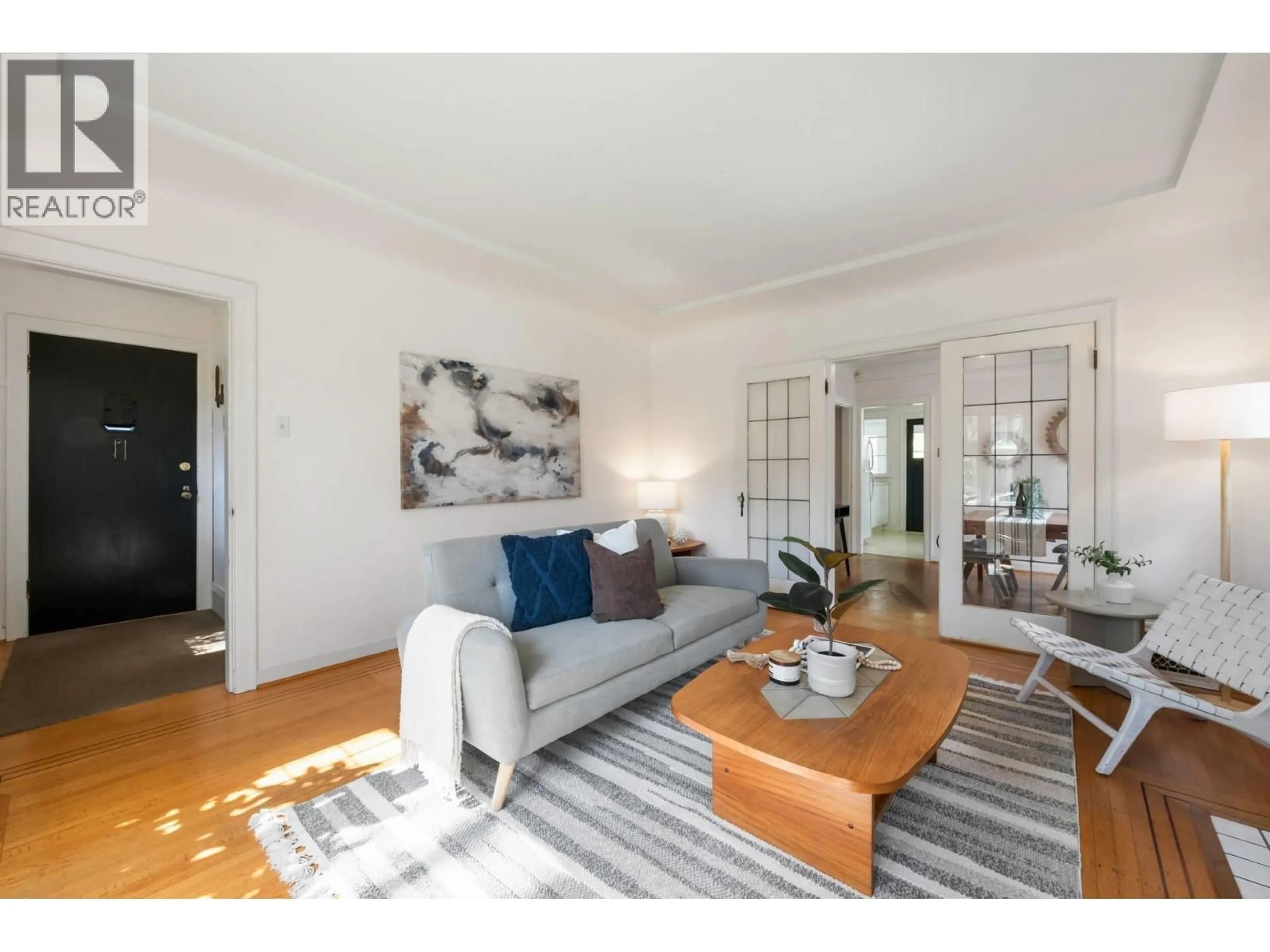 Living room with furniture, wood/laminate floor for 85 W 21ST AVENUE, Vancouver British Columbia V5Y2E1