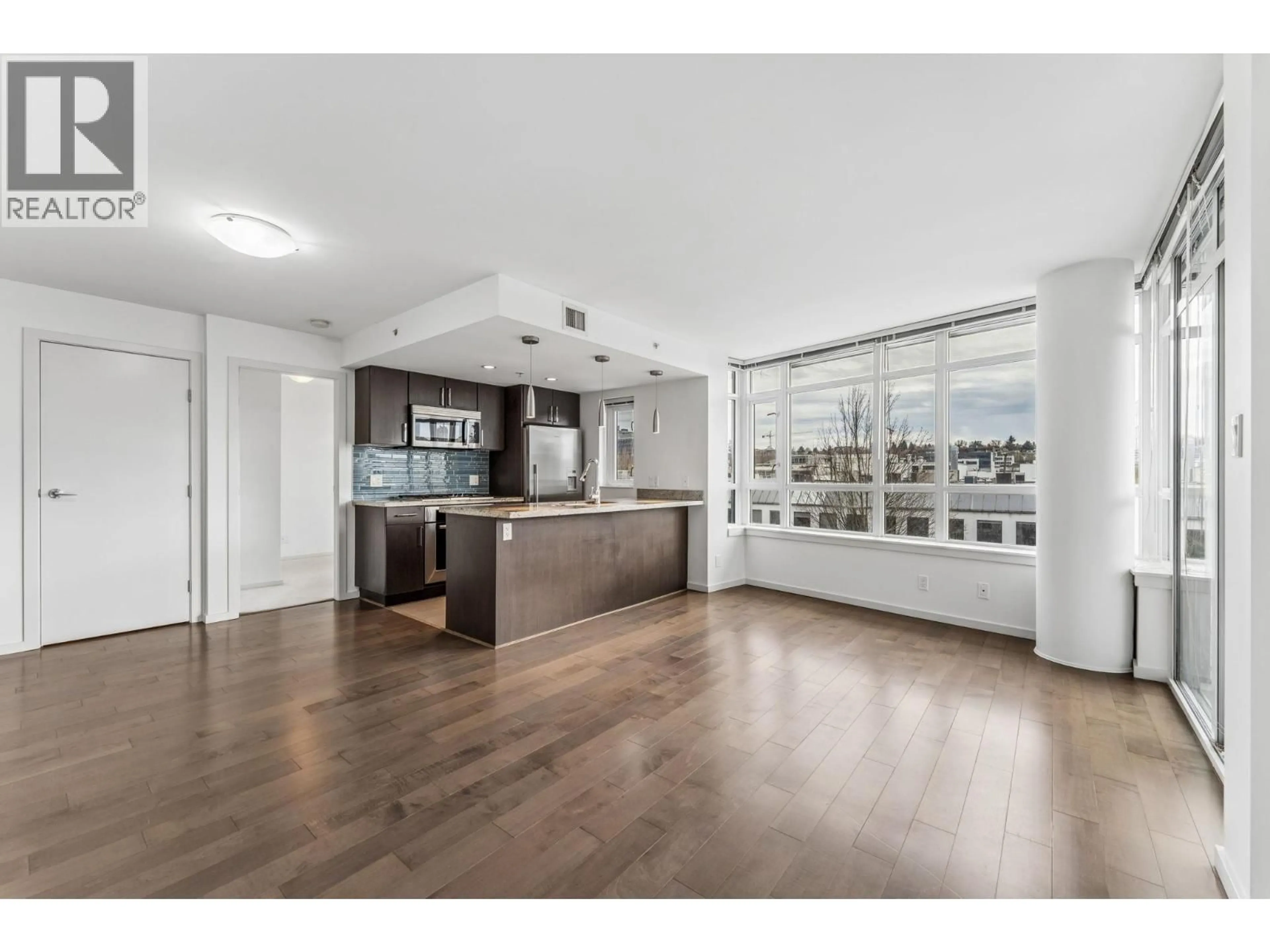 Open concept kitchen, wood/laminate floor for 503 - 89 2ND AVENUE, Vancouver British Columbia V5Y0G9