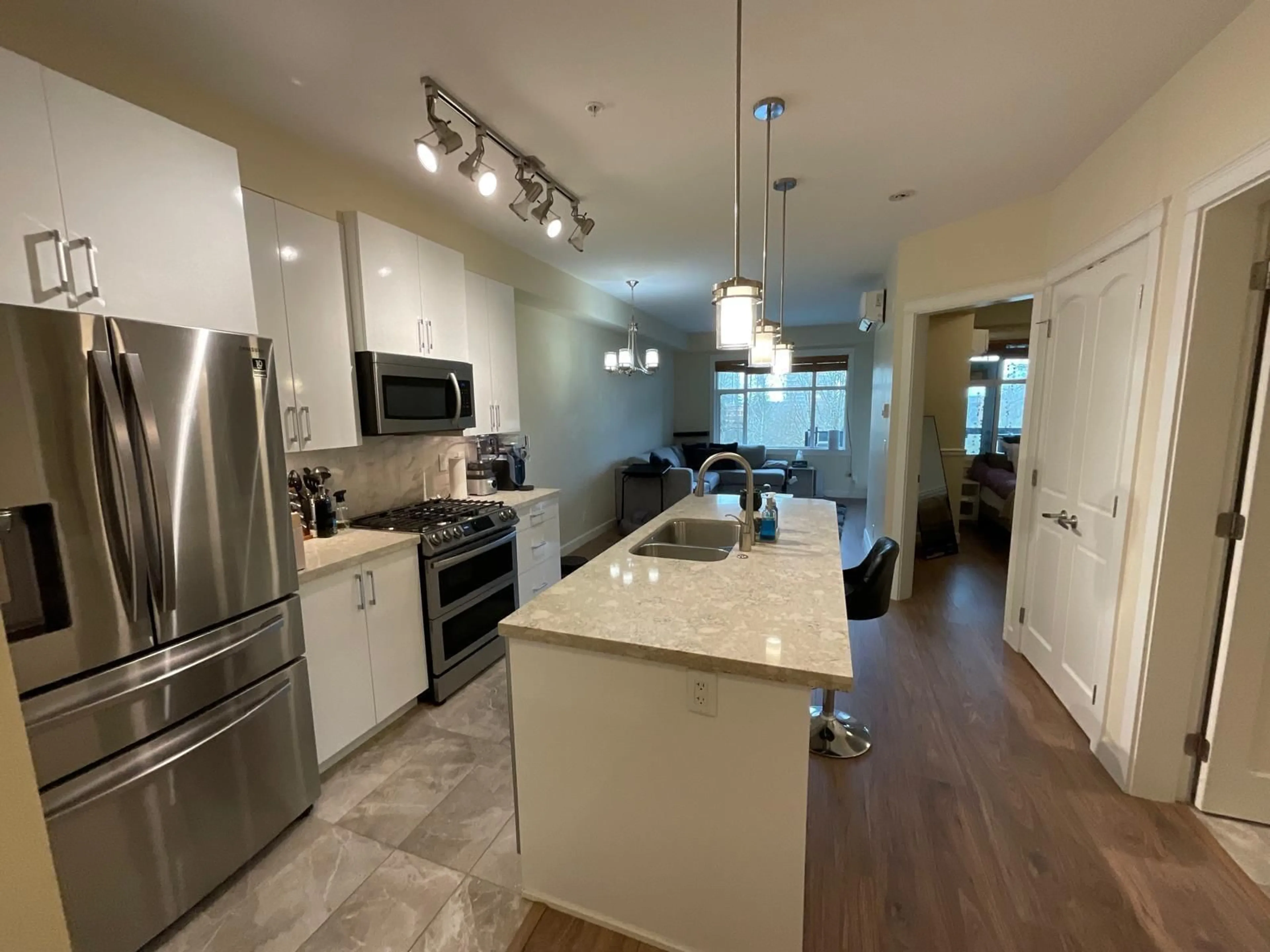 Open concept kitchen, ceramic/tile floor for 401 - 8558 202B STREET, Langley British Columbia V2Y3L4