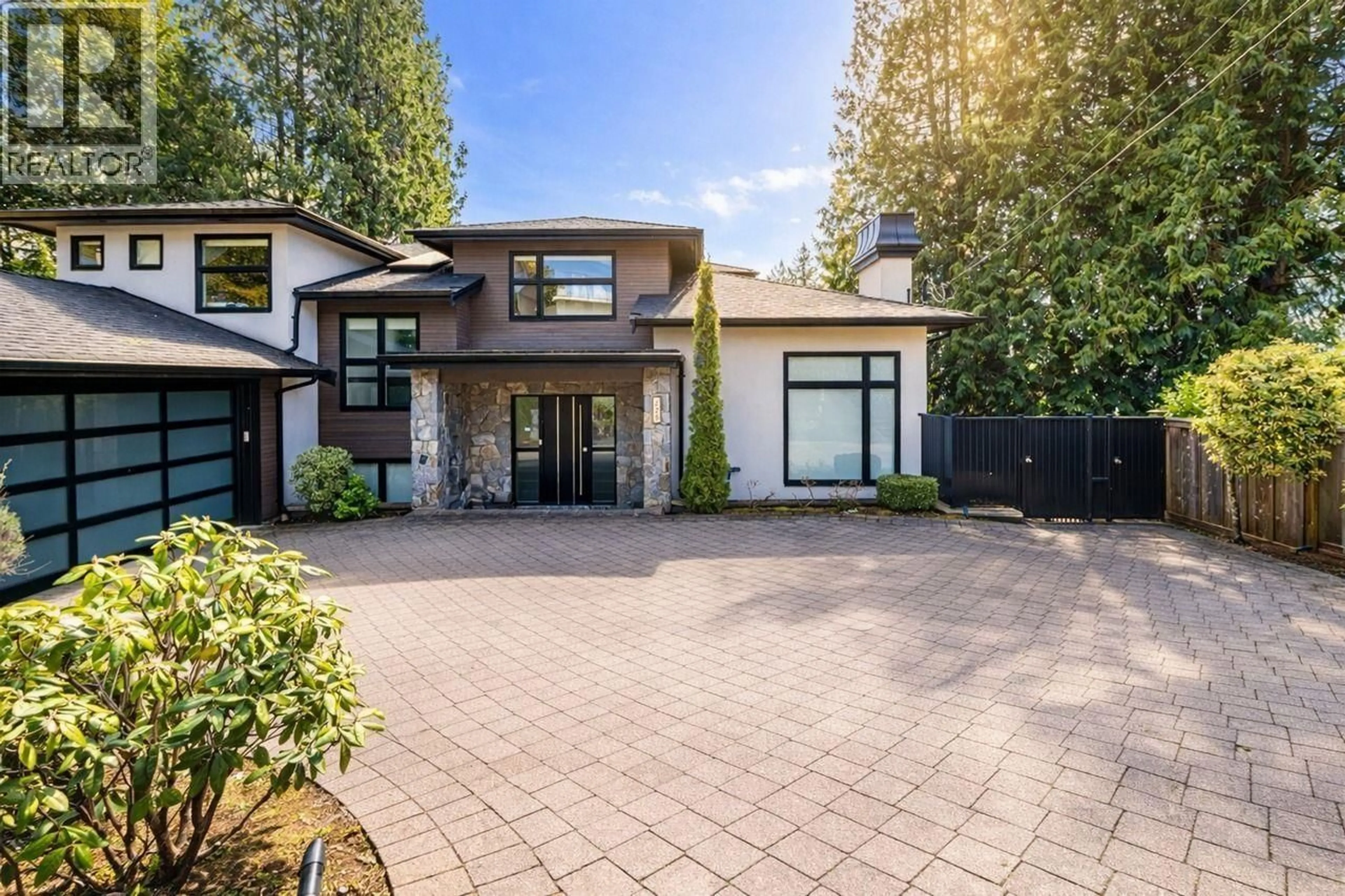 Home with brick exterior material, street for 225 TAMARACK ROAD, North Vancouver British Columbia V7N1S3