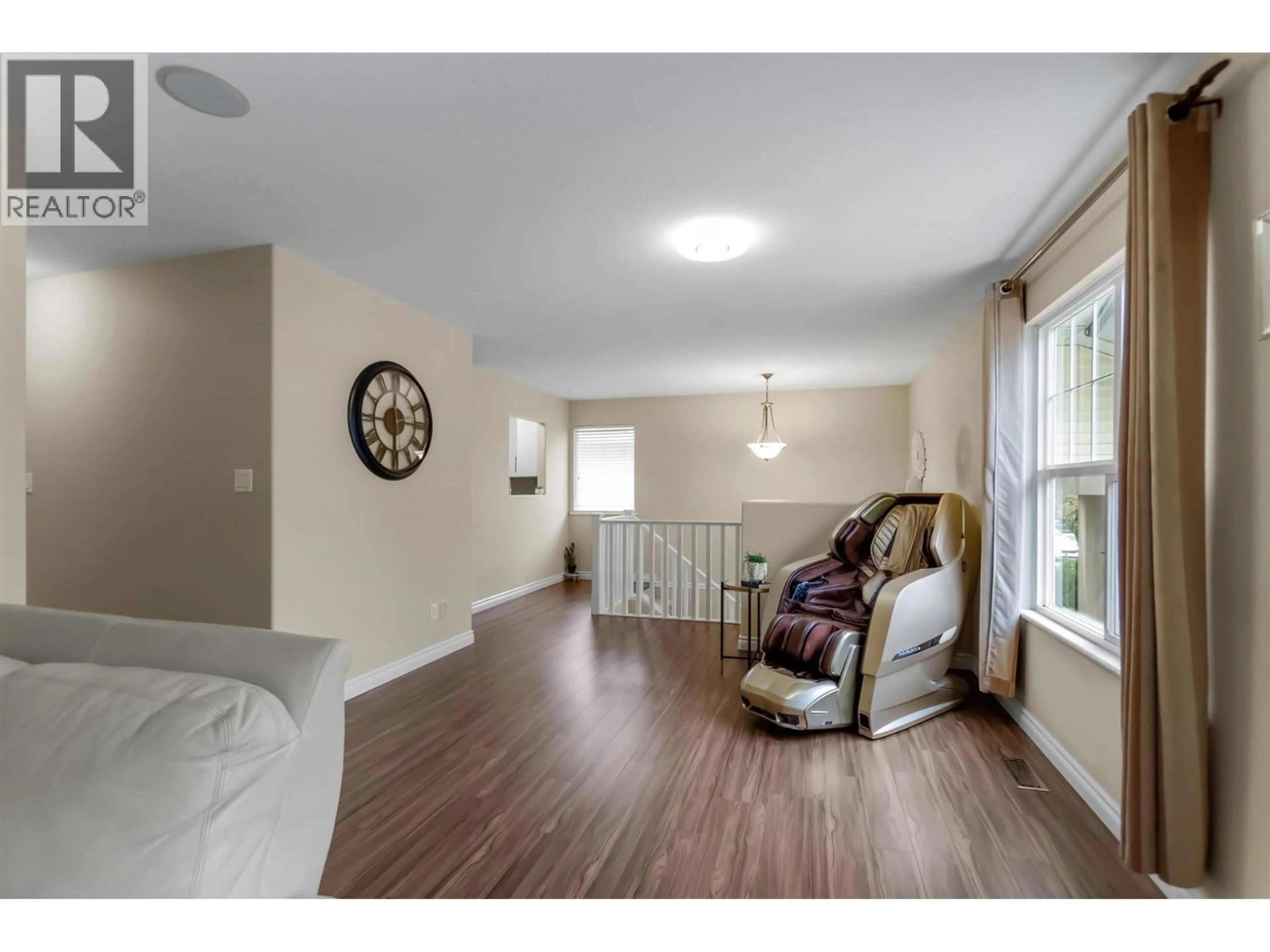 Living room with furniture, wood/laminate floor for 11469 207 STREET, Maple Ridge British Columbia V2X1W9