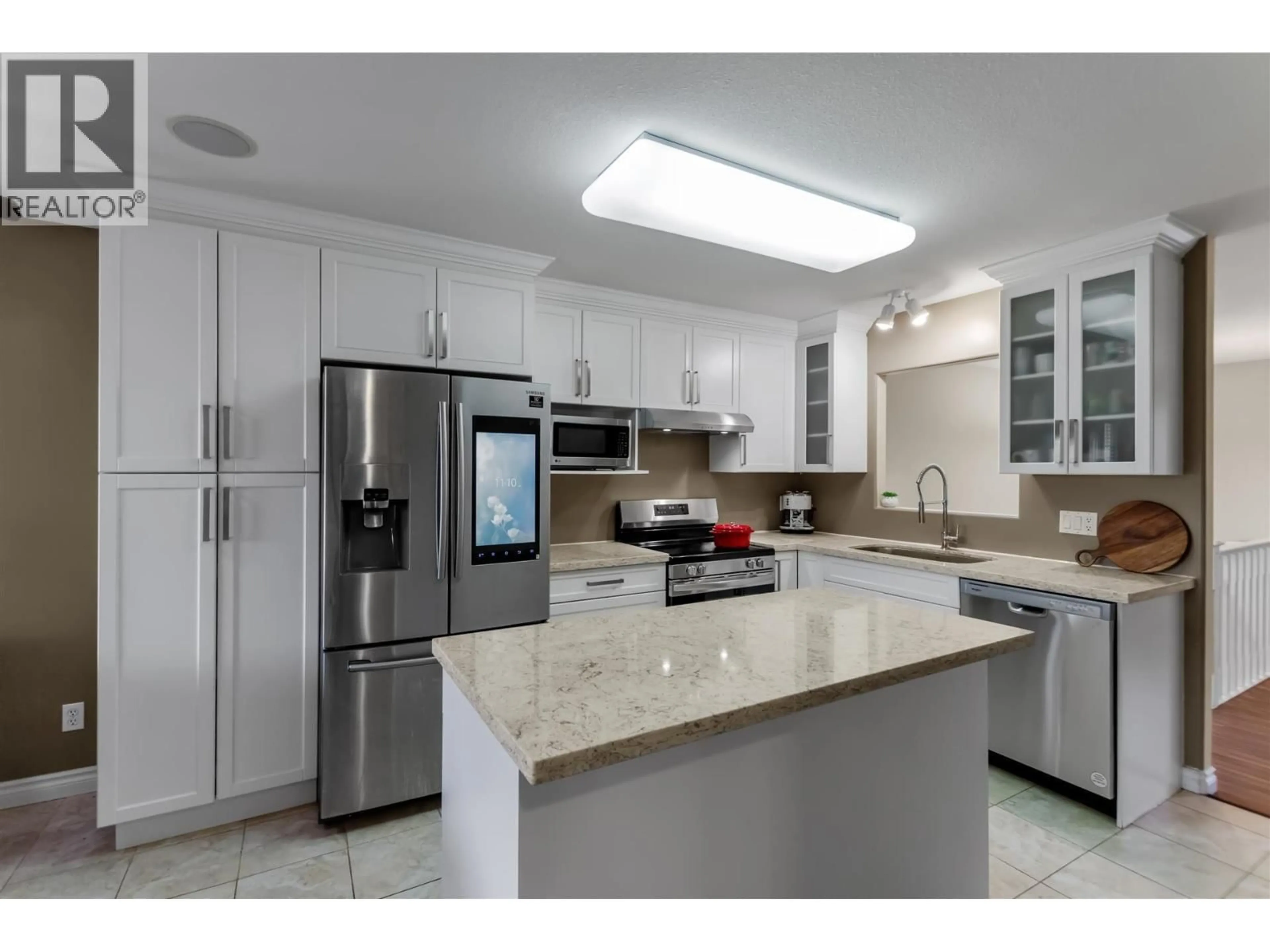 Open concept kitchen, ceramic/tile floor for 11469 207 STREET, Maple Ridge British Columbia V2X1W9
