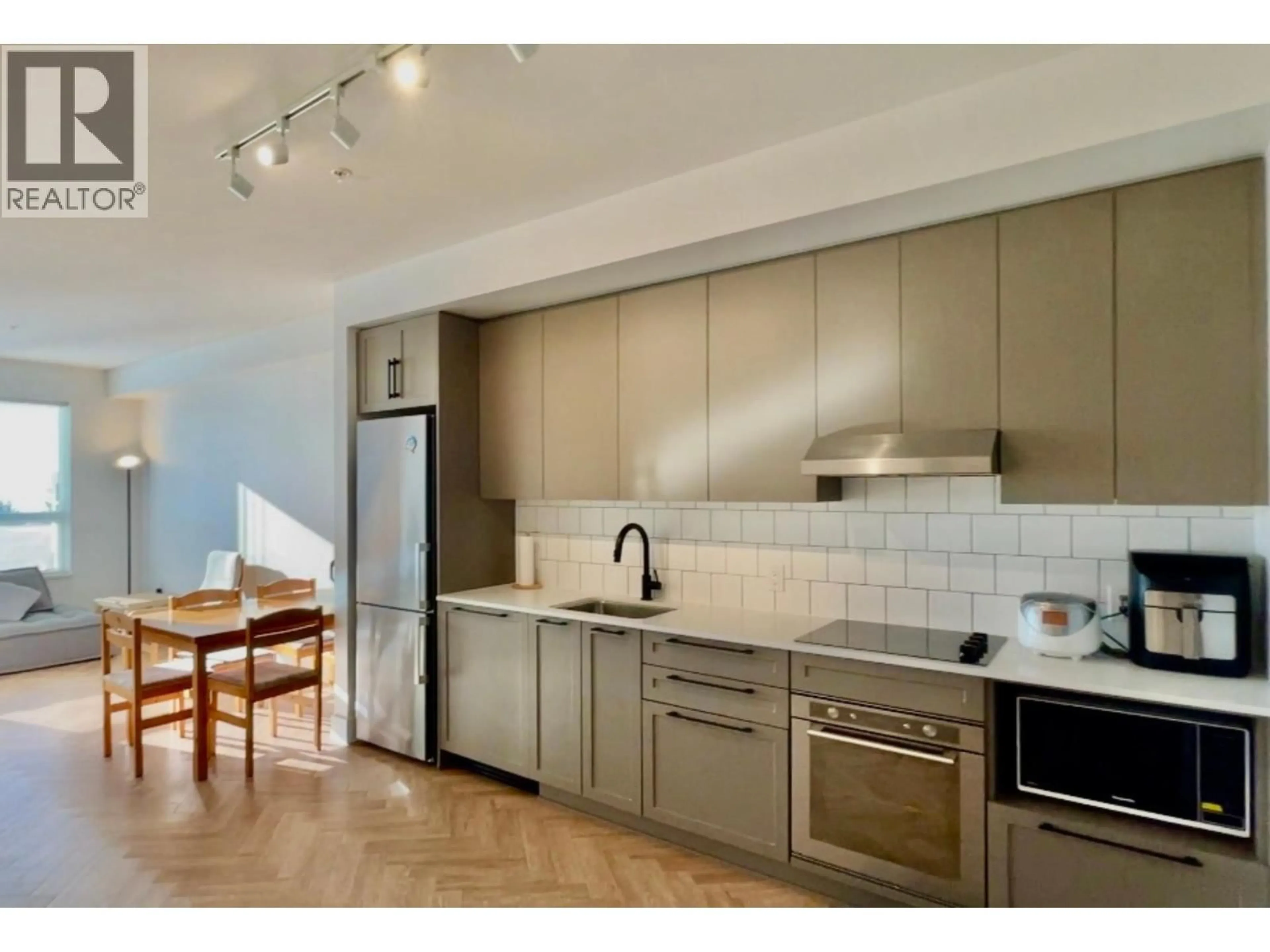 Open concept kitchen, unknown for 309 - 9228 SLOPES MEWS, Burnaby British Columbia V5A0E9