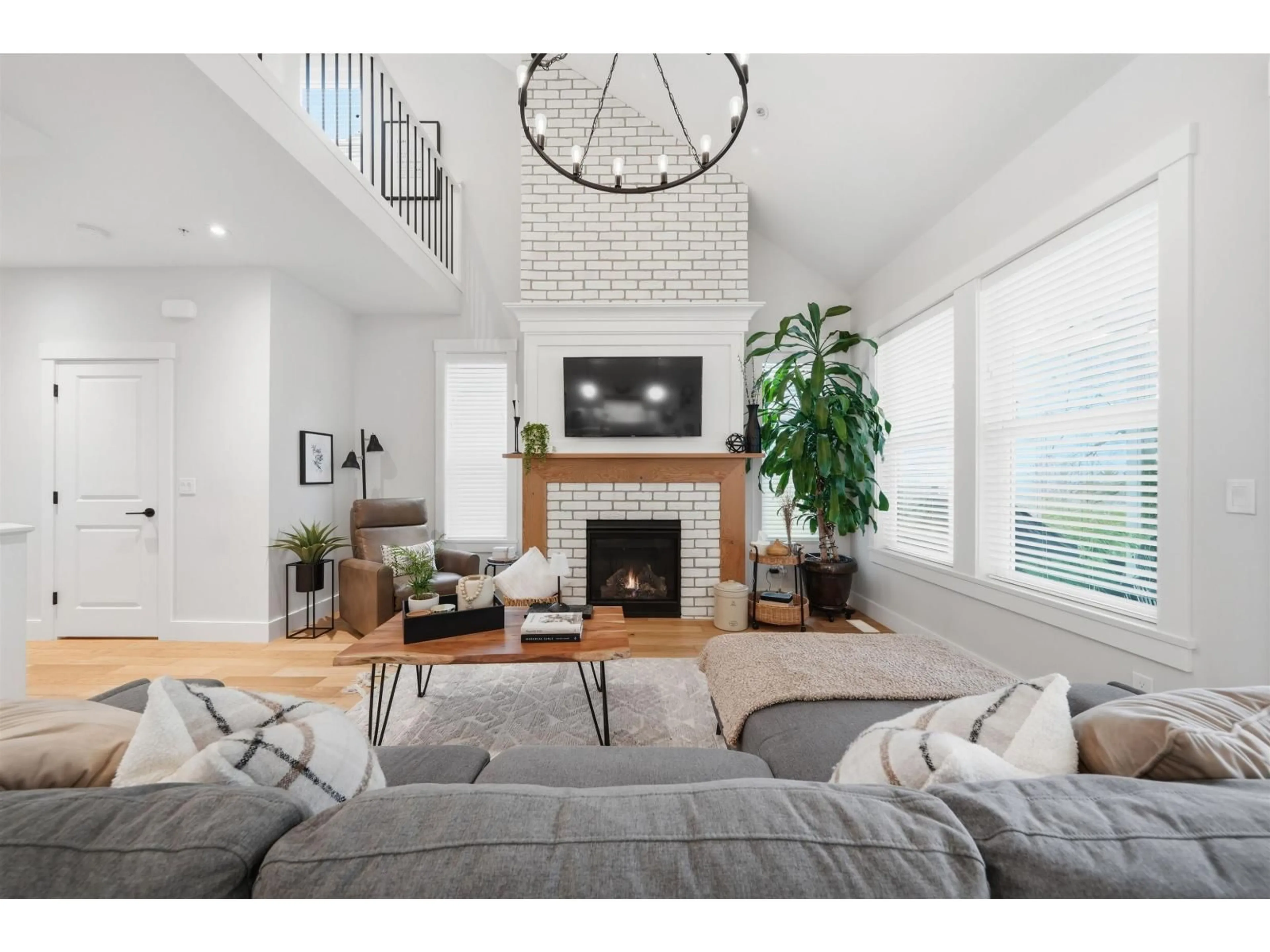 Living room with furniture, wood/laminate floor for 8 - 21858 47B AVENUE, Langley British Columbia V3A8H1