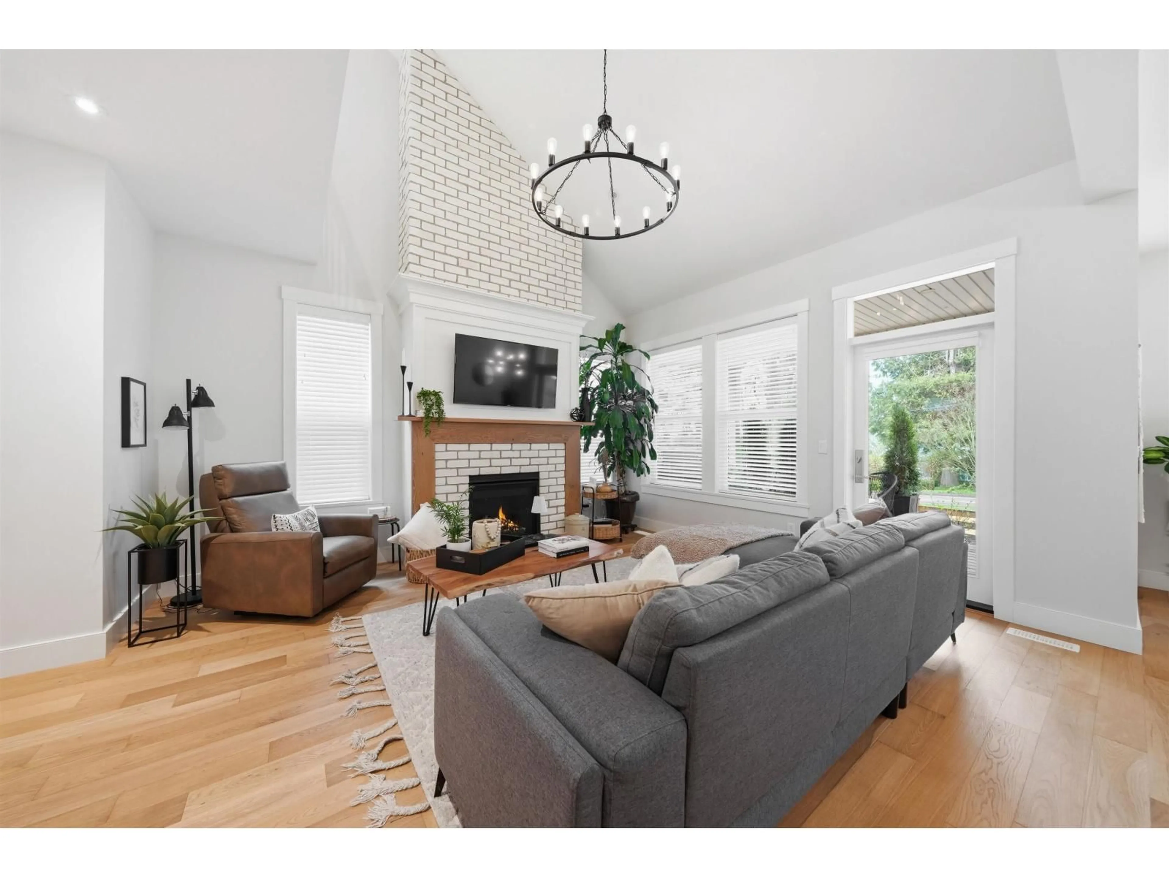 Living room with furniture, wood/laminate floor for 8 - 21858 47B AVENUE, Langley British Columbia V3A8H1