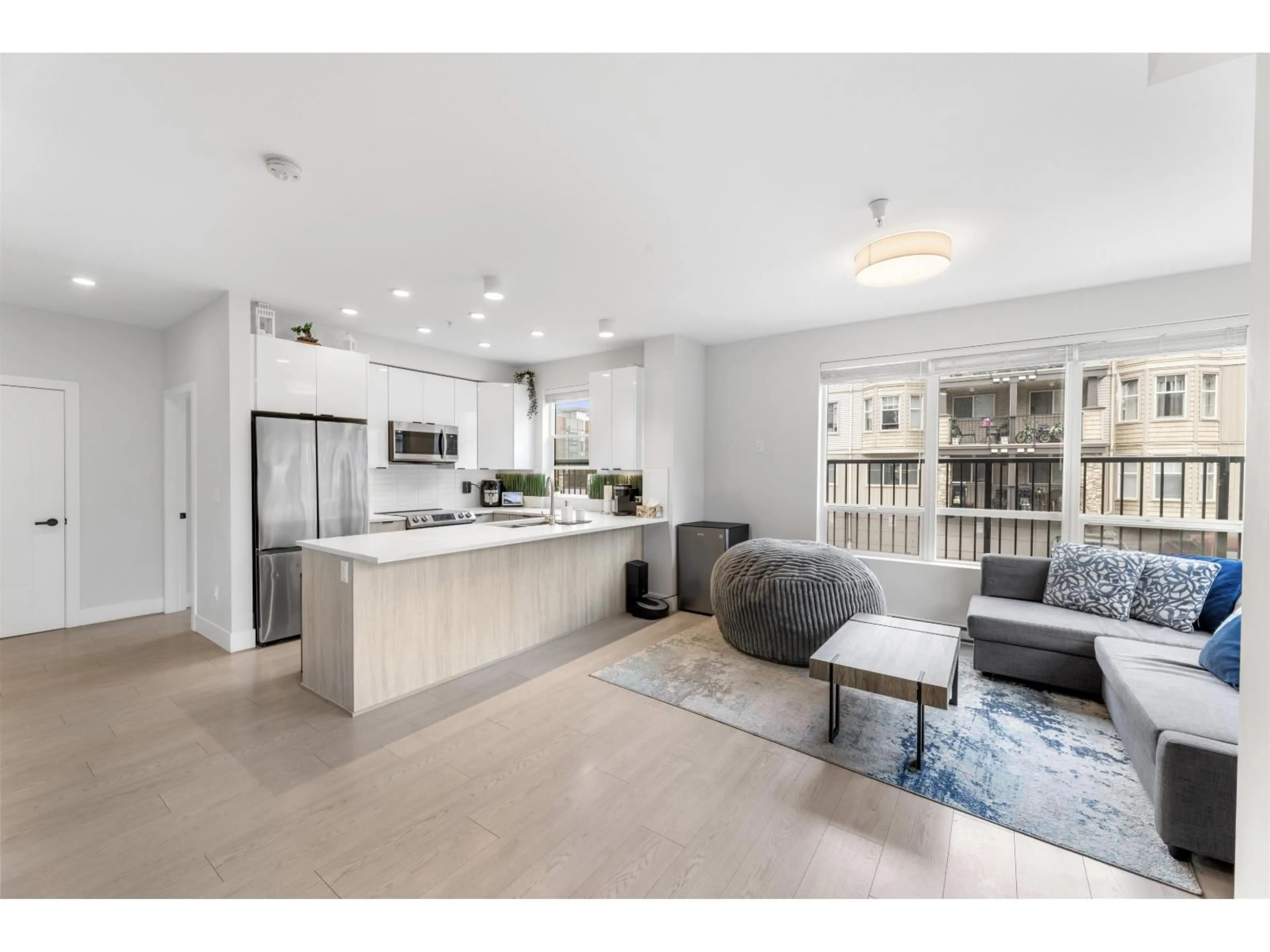 Open concept kitchen, unknown for 103 - 19825 54 AVENUE, Langley British Columbia V3A0P6