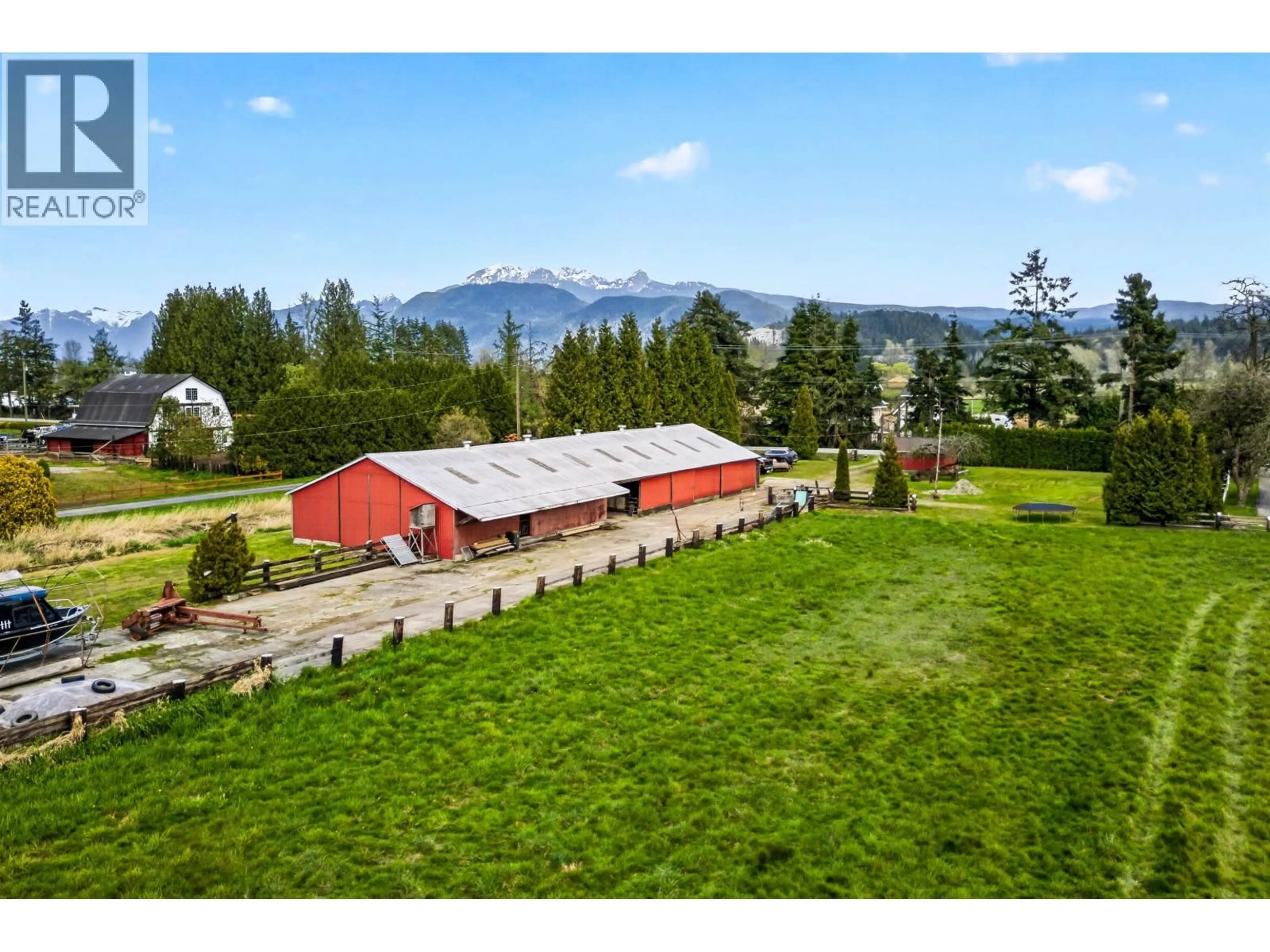 A pic from outside/outdoor area/front of a property/back of a property/a pic from drone, mountain view for 15023 HARRIS ROAD, Pitt Meadows British Columbia V3Y1Z1