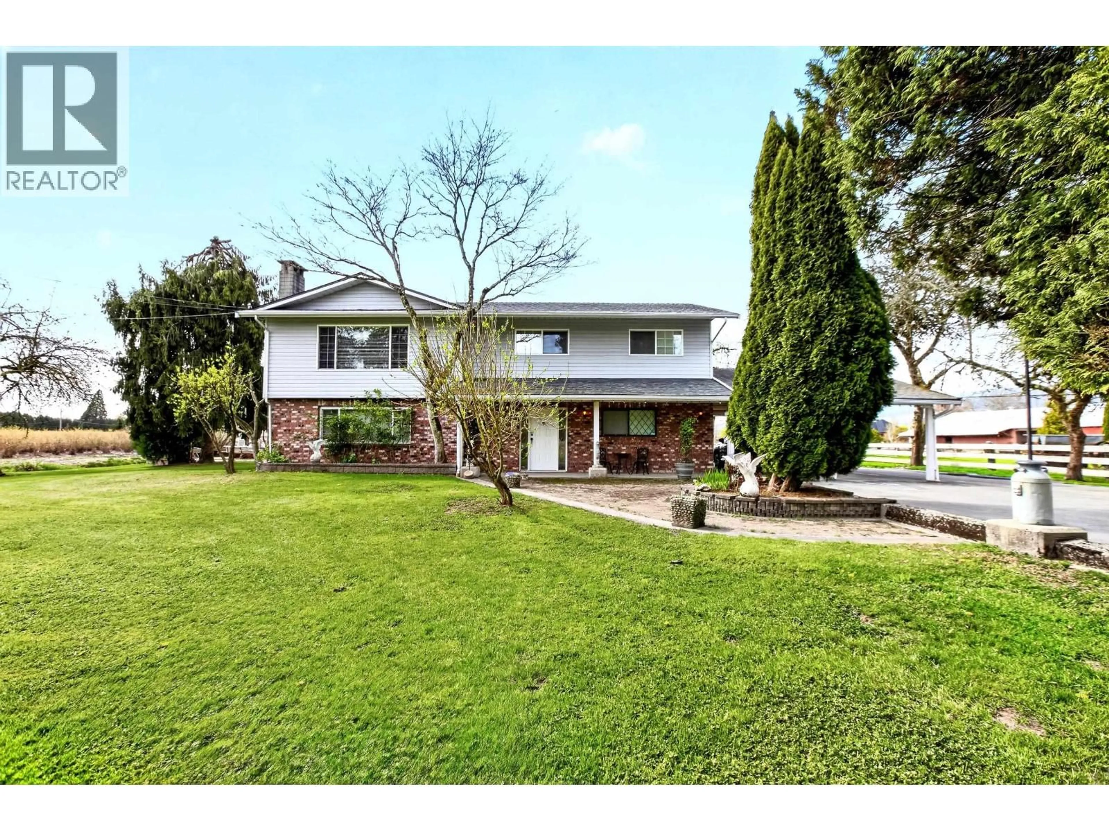 A pic from outside/outdoor area/front of a property/back of a property/a pic from drone, street for 15023 HARRIS ROAD, Pitt Meadows British Columbia V3Y1Z1