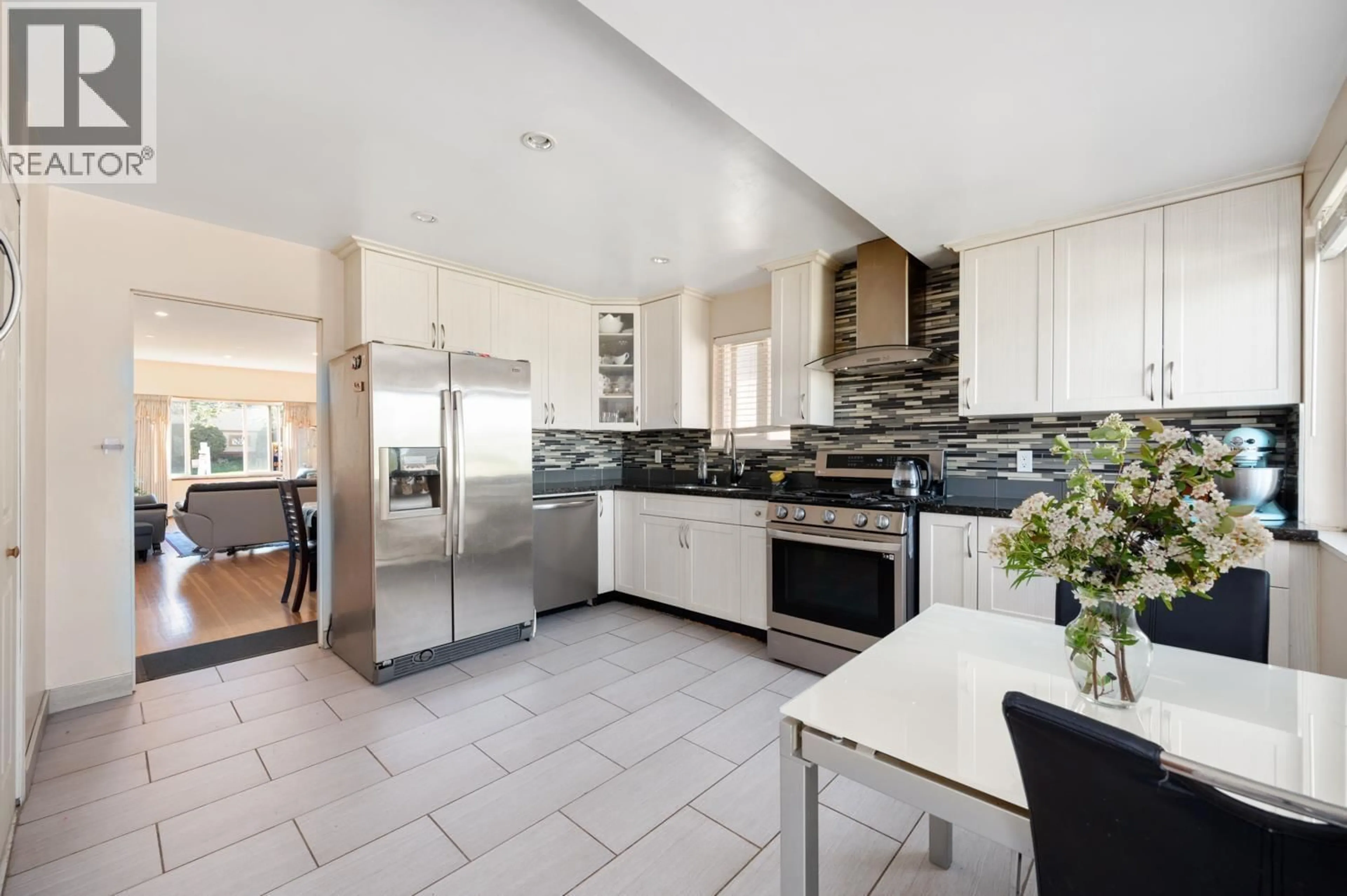 Contemporary kitchen, ceramic/tile floor for 620 SLOCAN STREET, Vancouver British Columbia V5K3X7