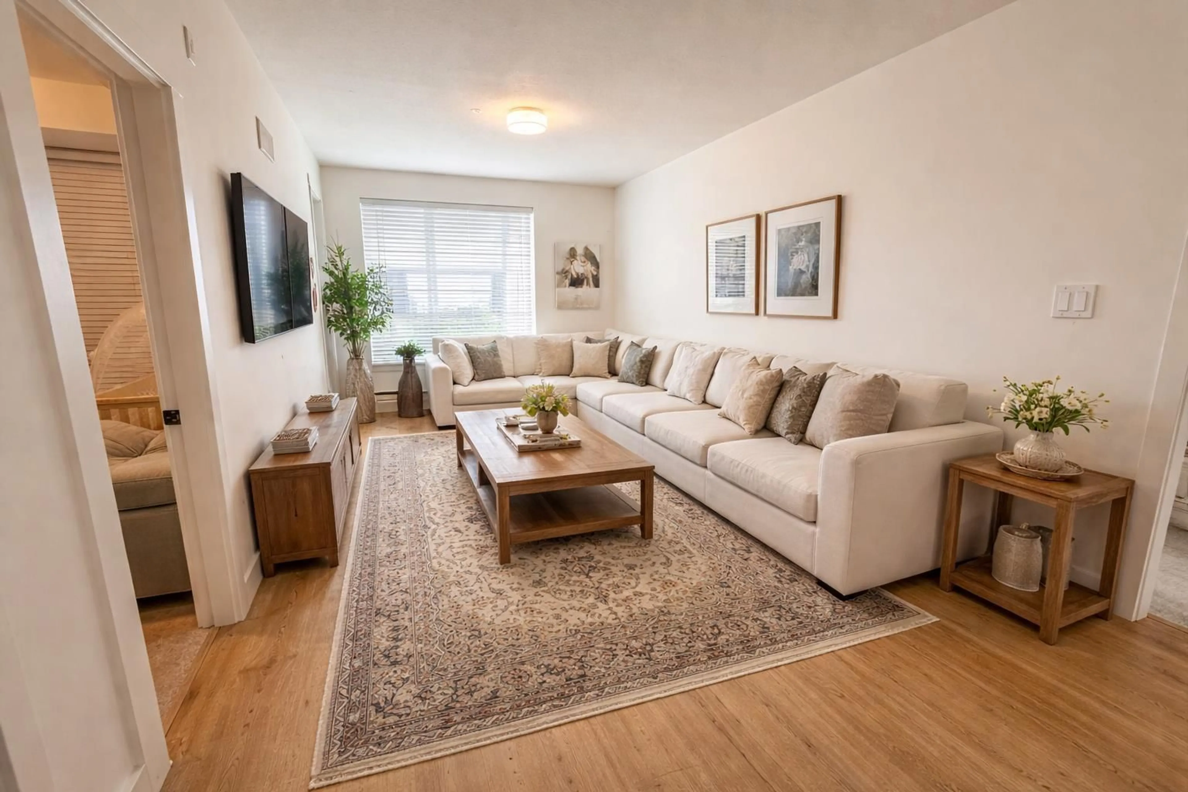 Living room with furniture, wood/laminate floor for 302 - 19935 75A AVENUE, Langley British Columbia V2Y4L6