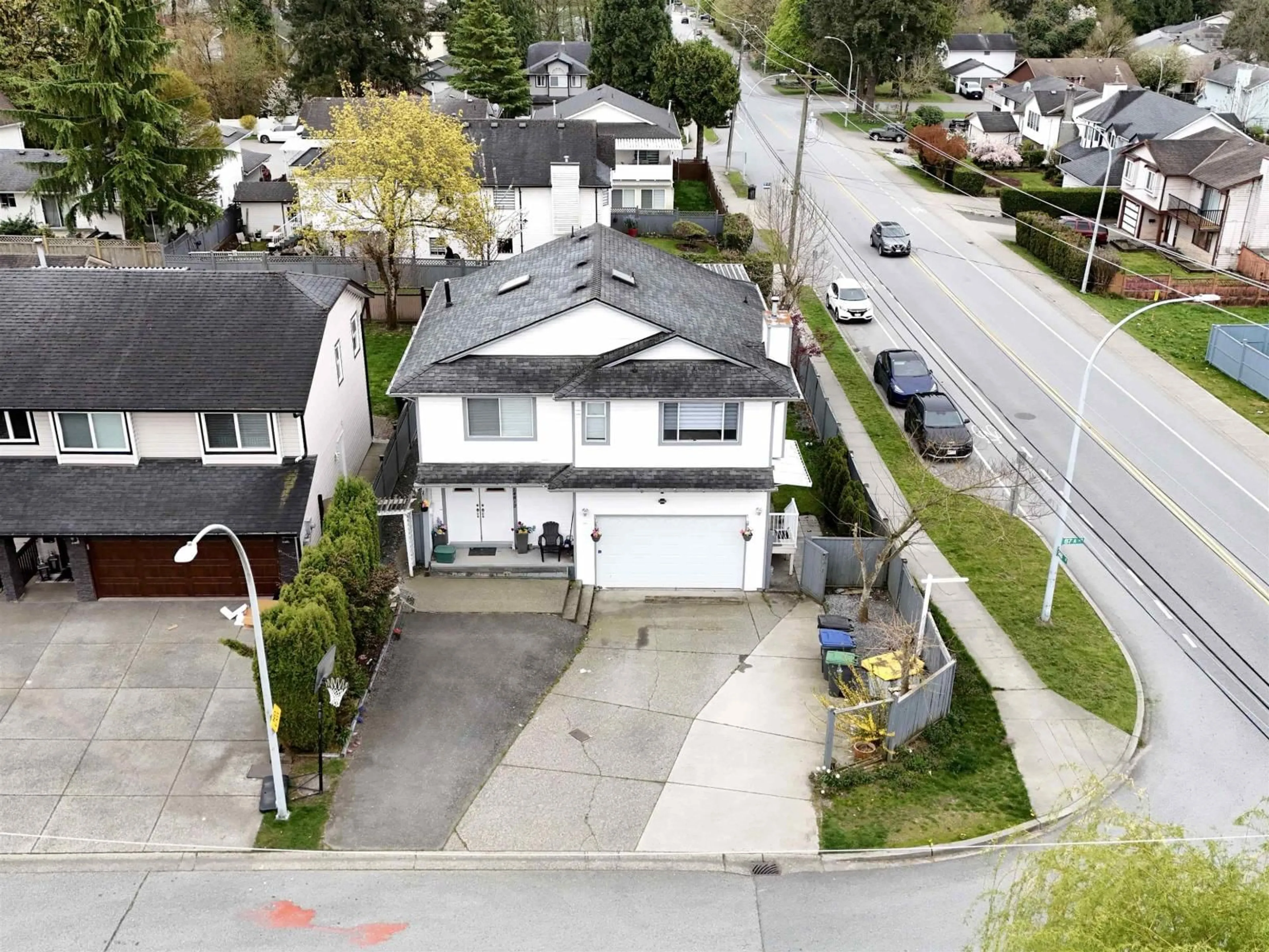 A pic from outside/outdoor area/front of a property/back of a property/a pic from drone, street for 14812 87A AVENUE, Surrey British Columbia V3S7R3