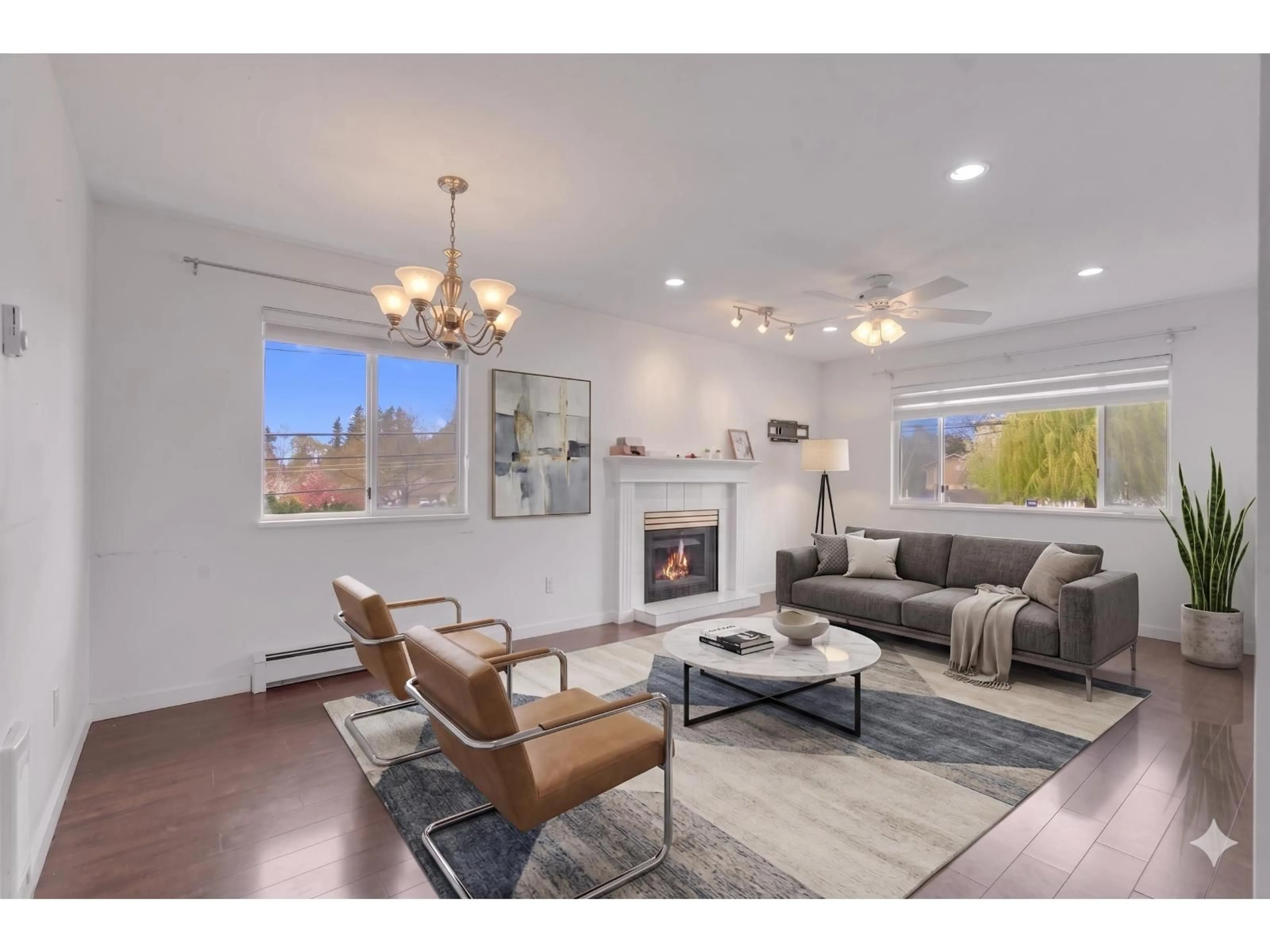 Living room with furniture, wood/laminate floor for 14812 87A AVENUE, Surrey British Columbia V3S7R3