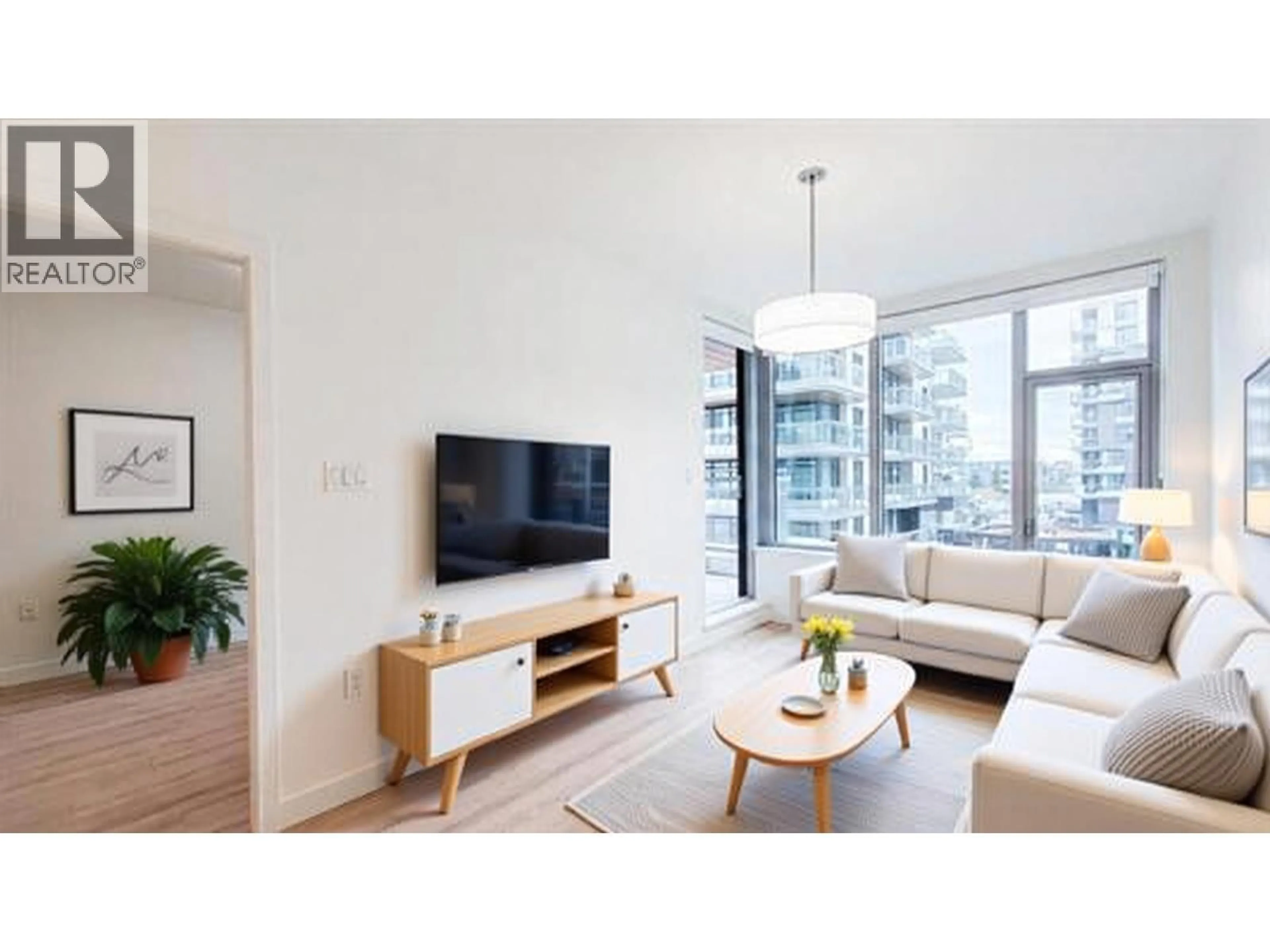 Living room with furniture, wood/laminate floor for 755 HARBOURSIDE DRIVE, North Vancouver British Columbia V7P0G1