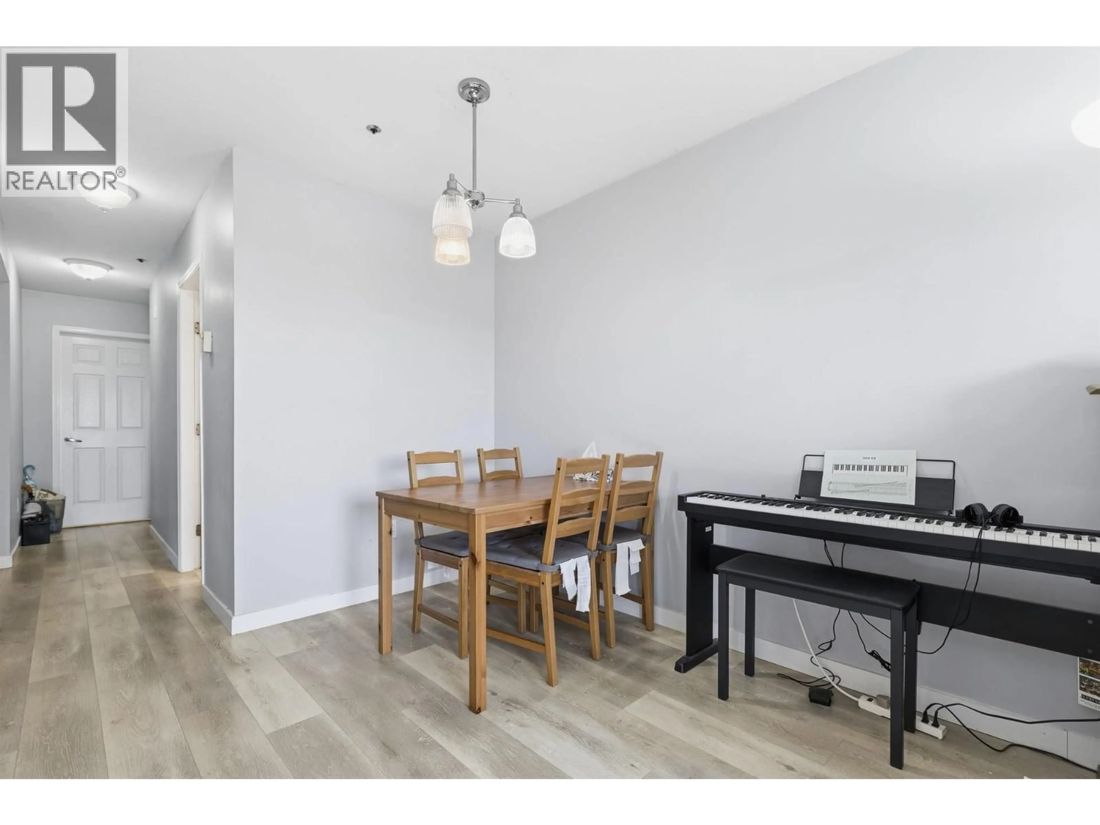 Dining room, wood/laminate floor for 303 - 1310 CARIBOO STREET, New Westminster British Columbia V3M1X2