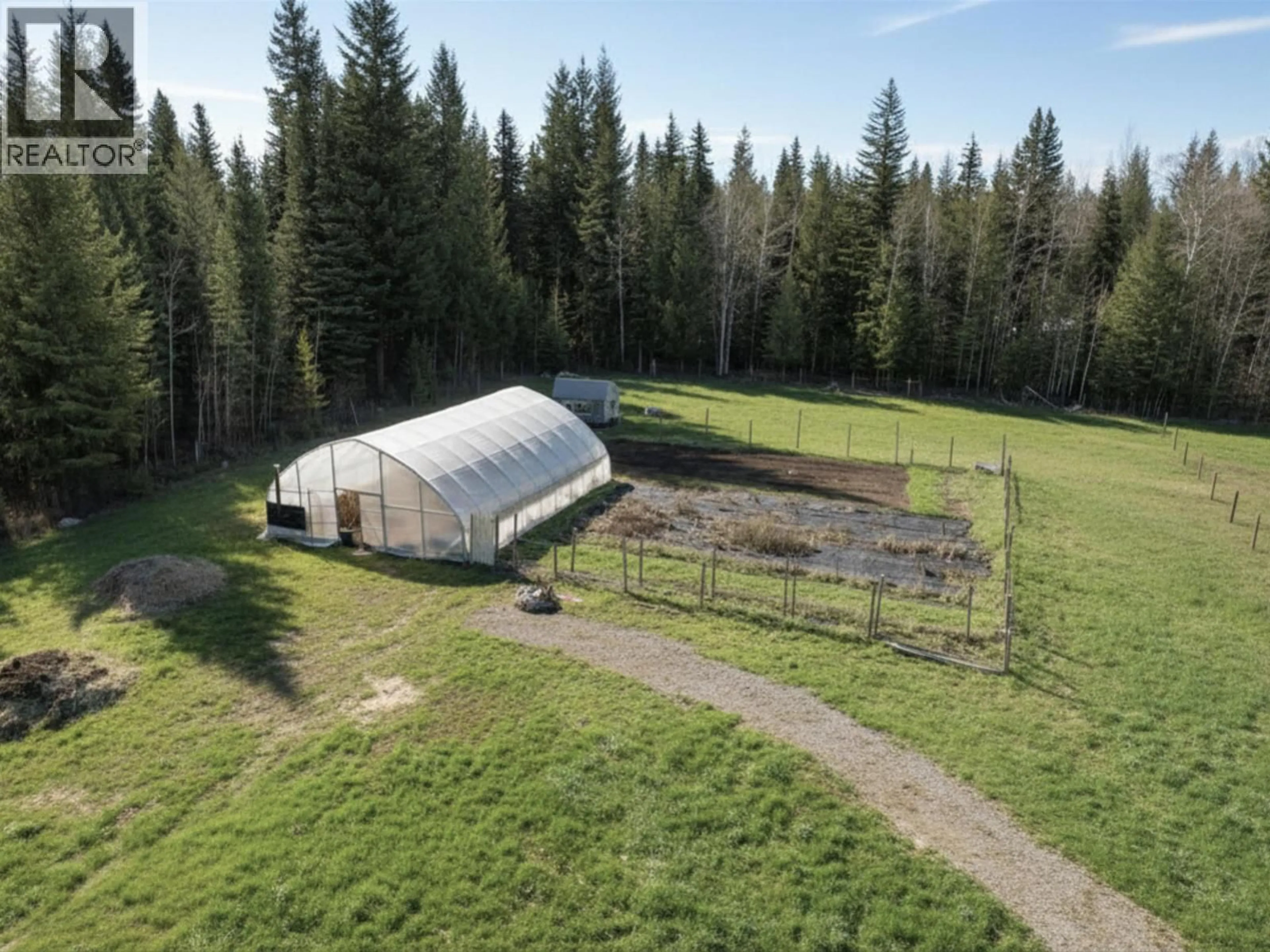 A pic from outside/outdoor area/front of a property/back of a property/a pic from drone, forest/trees view for 2852 PINNACLES ROAD, Quesnel British Columbia V2J7G9