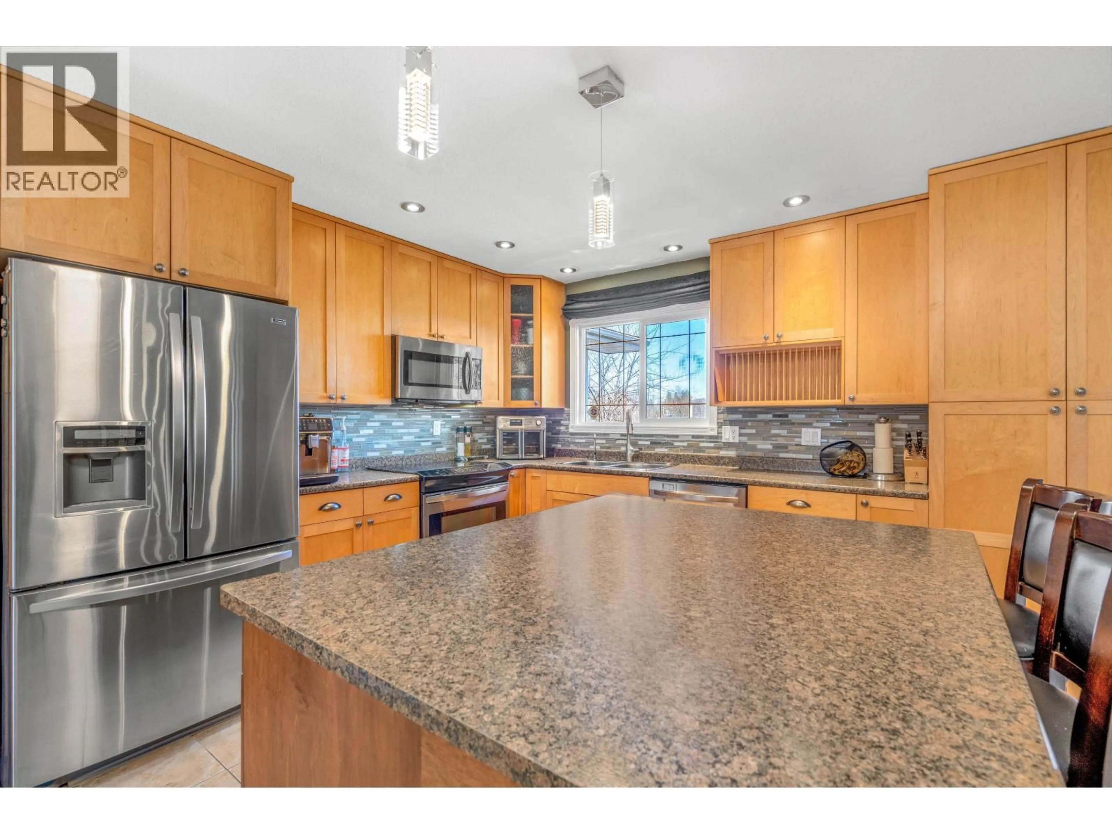 Open concept kitchen, ceramic/tile floor for 2882 CALHOUN CRESCENT, Prince George British Columbia V2N5J9