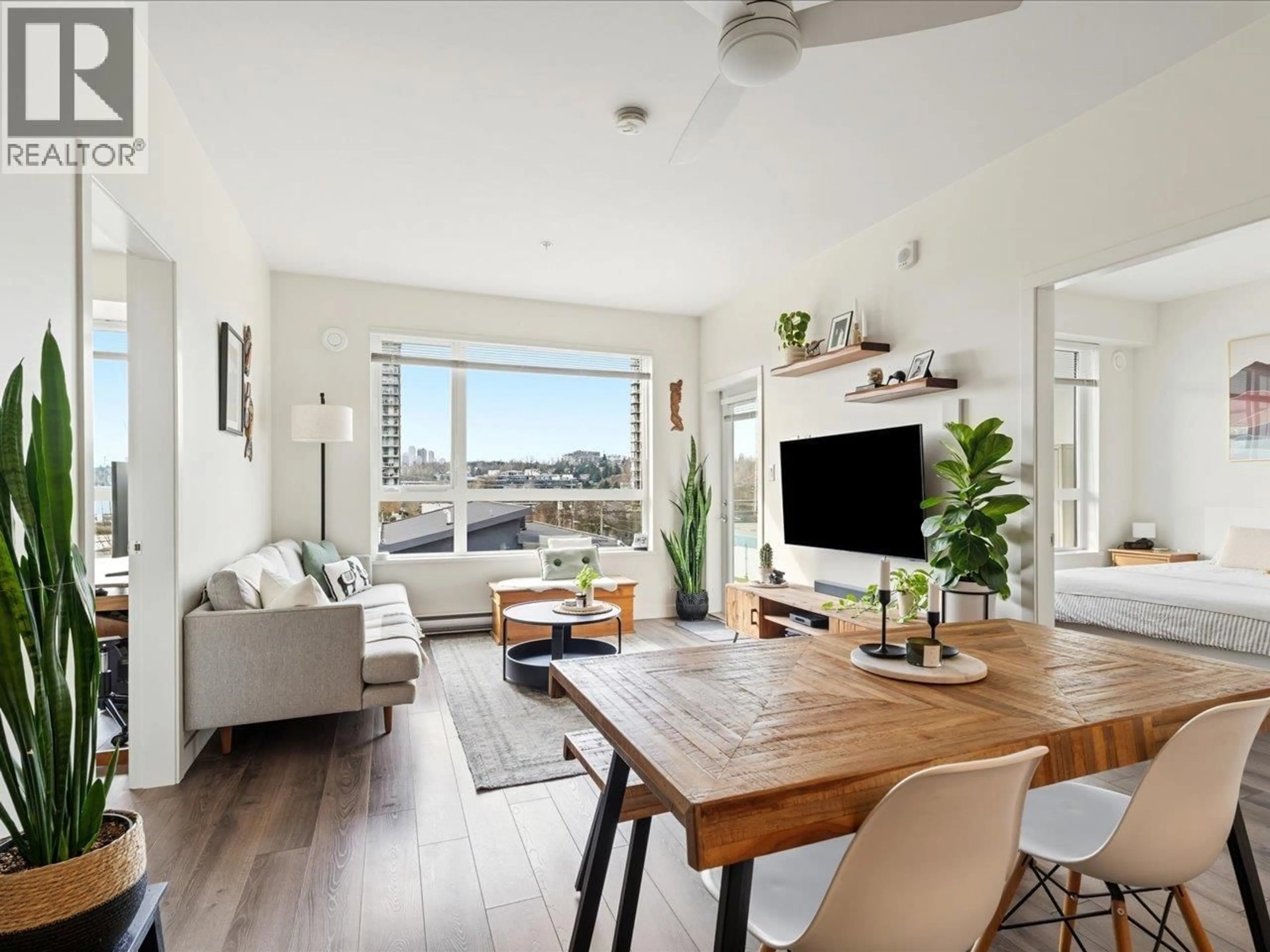 Living room with furniture, wood/laminate floor for 307 - 2188 MADISON AVENUE, Burnaby British Columbia V5C0J8